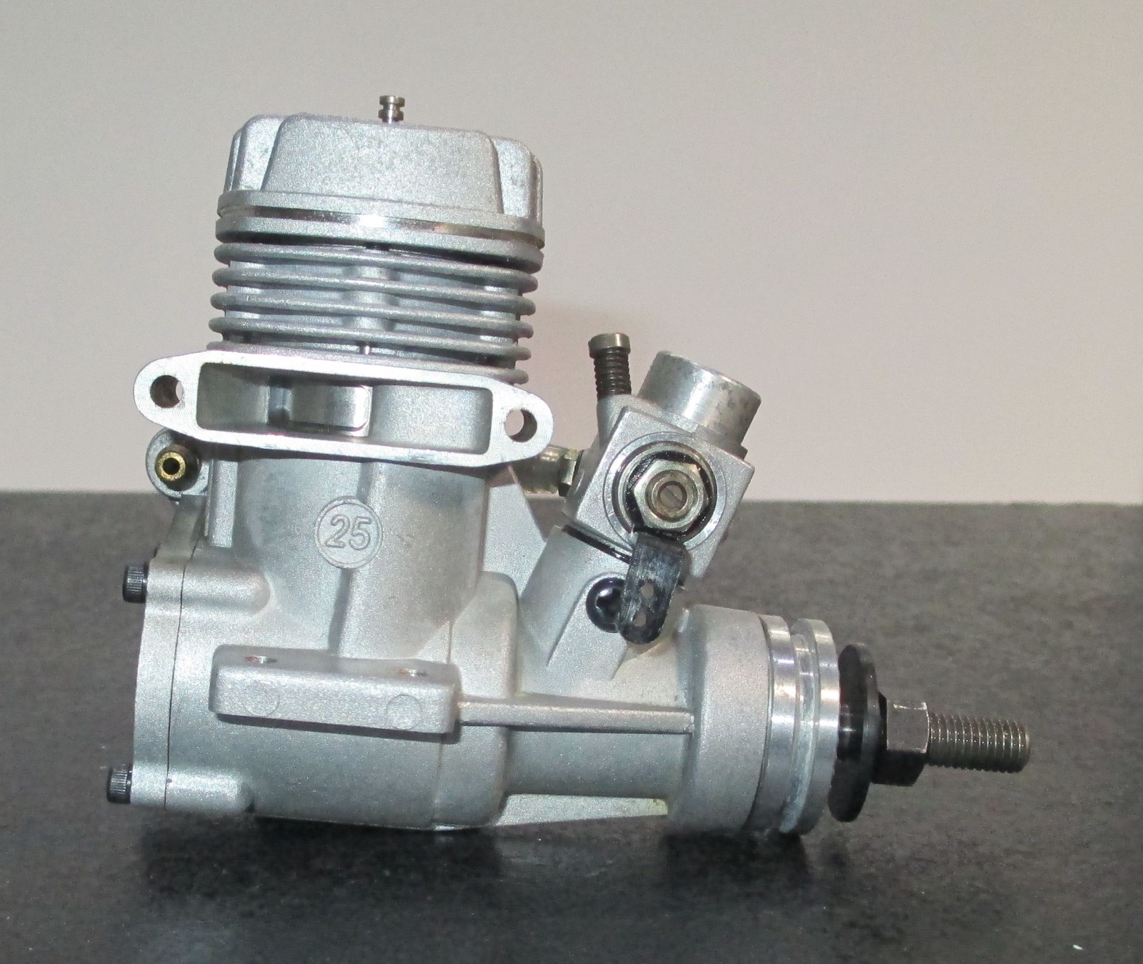 O.S. MAX-25FX 4.07cc 2-Stroke Glow Engine Includes muffler; used for RC airplane