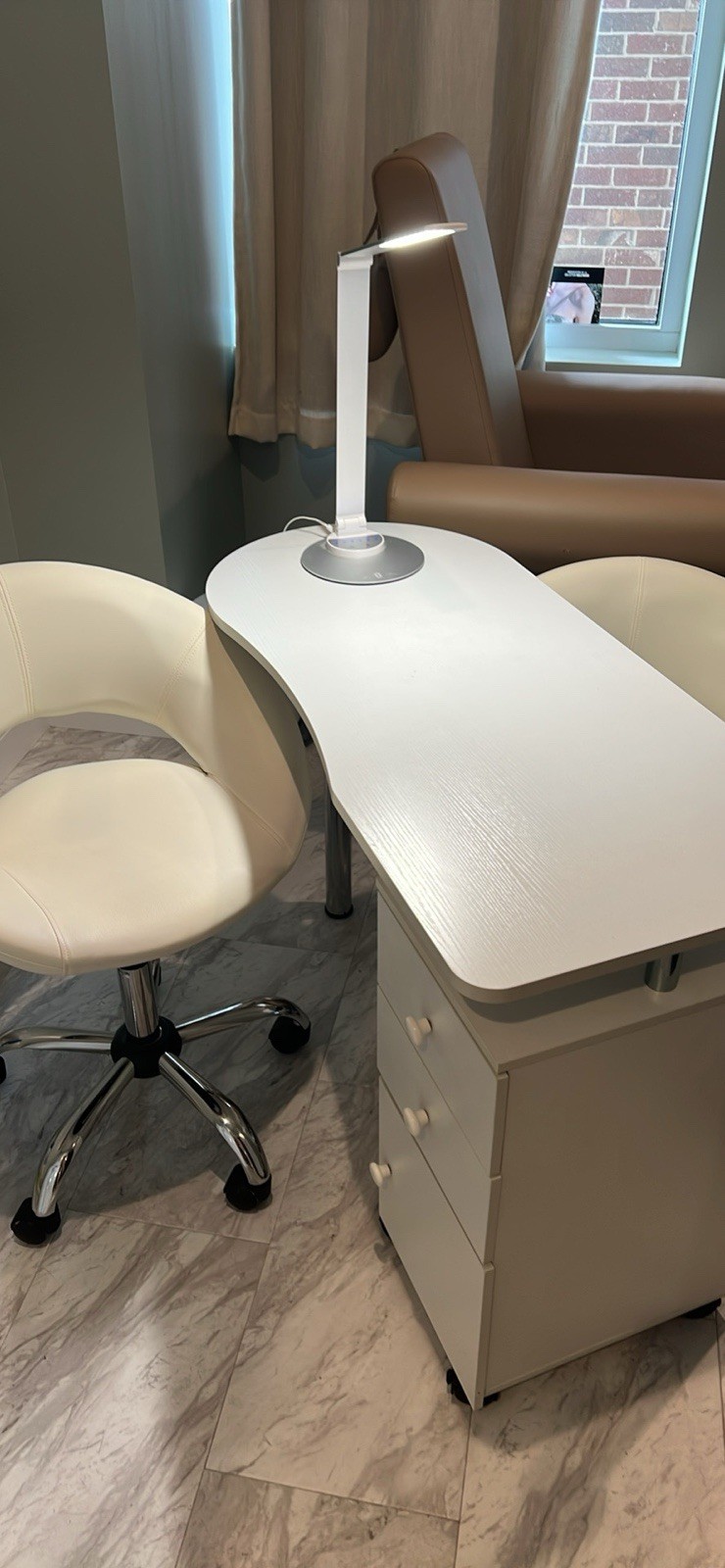 Nail Table With Two Leather Rolling Chairs