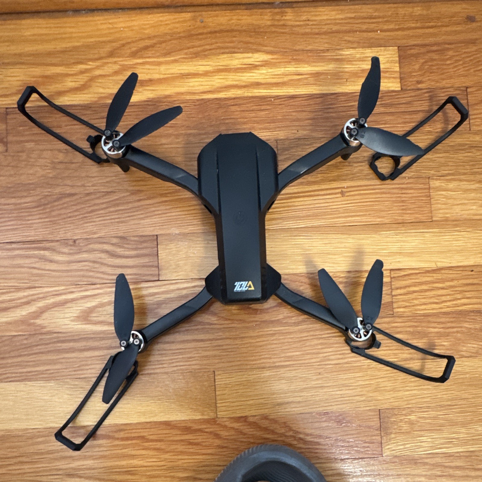 TEZA Foldable RC Quadcopter Drone w/ Remote Controller & Case, Black Electric