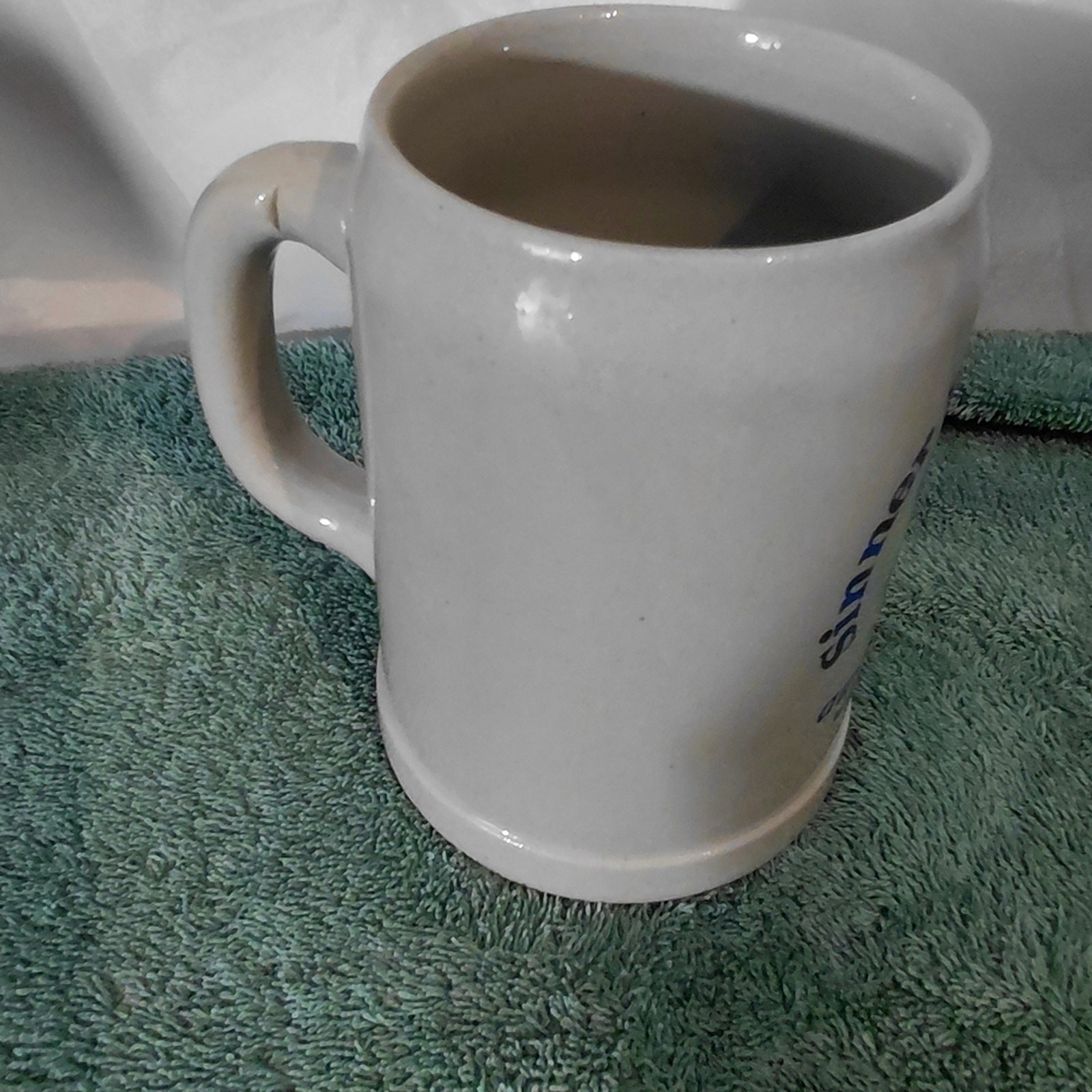 White Ceramic Beer Stein with Blue Crest