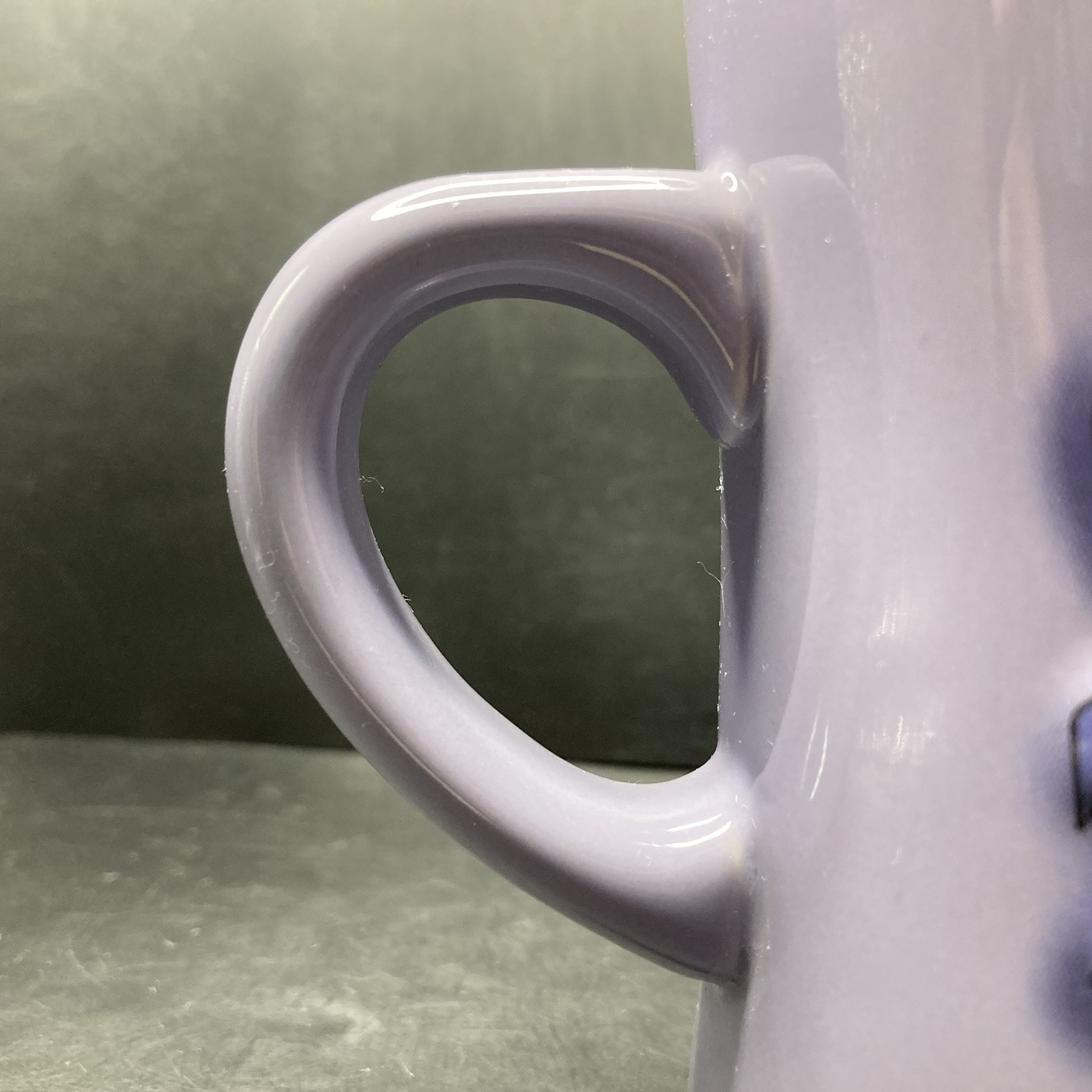 Disney Store Eeyore Bursting Through a Wall LARGE Purple Embossed Ceramic Mug