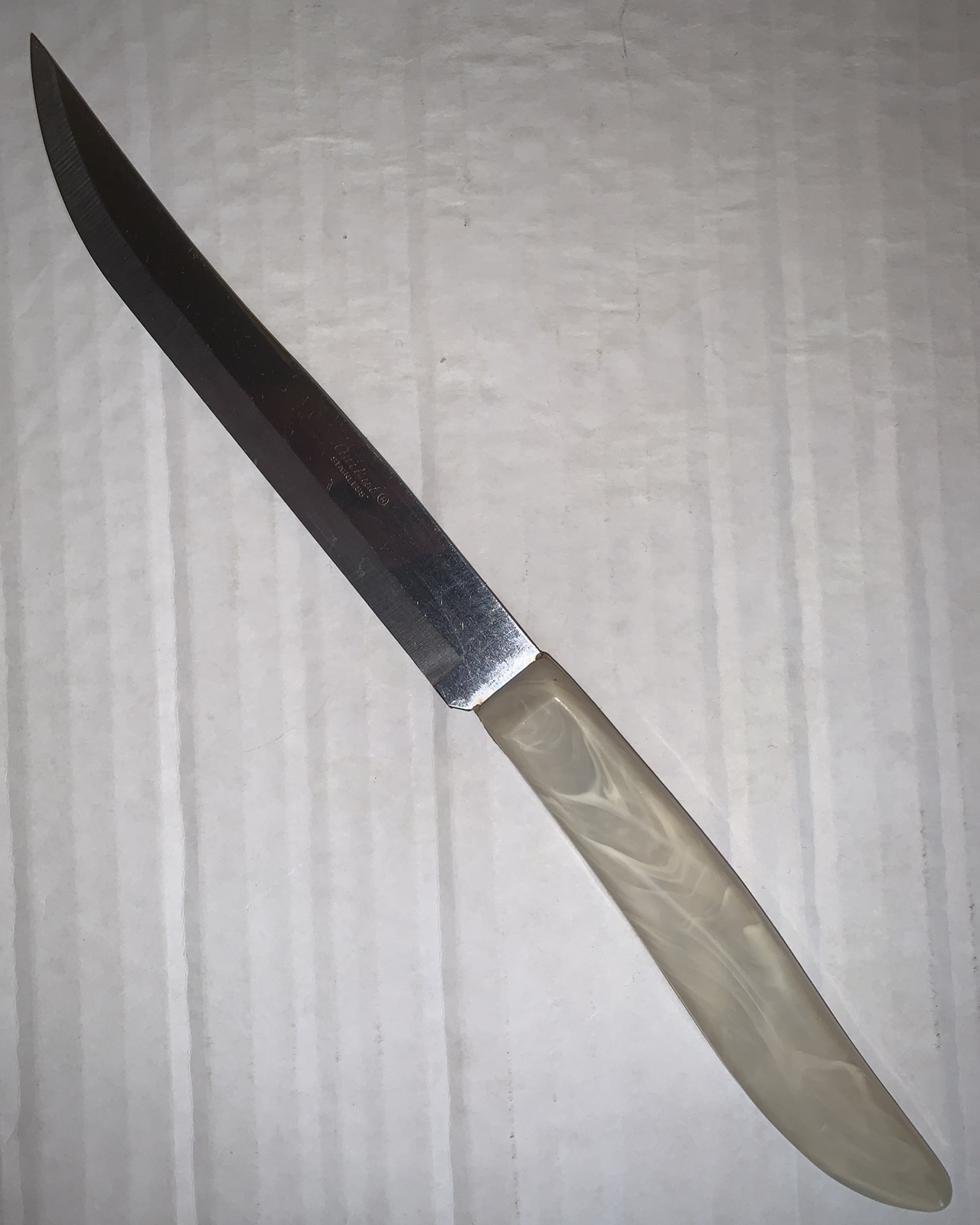 Quikut Stainless Knife With Marbled Plastic Handle