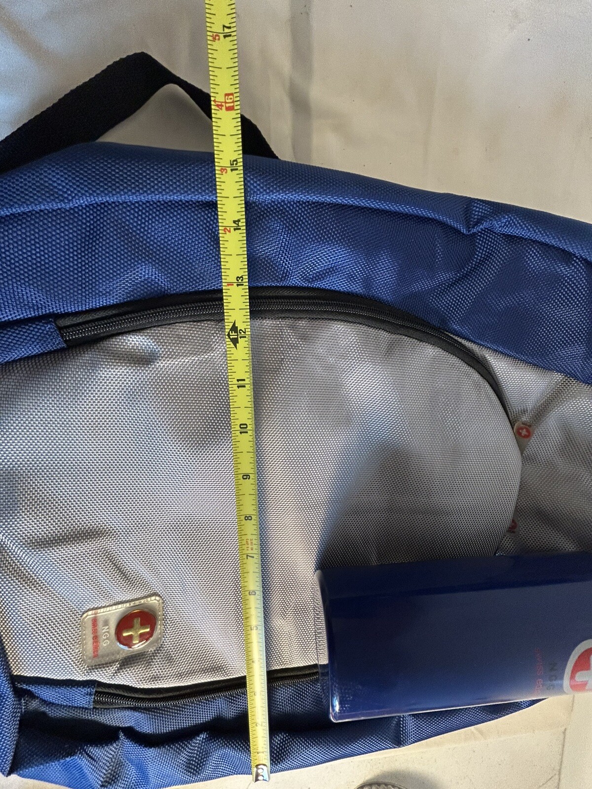 Blue/Grey NGG Swiss Edition Backpack with blue water bottle computer school