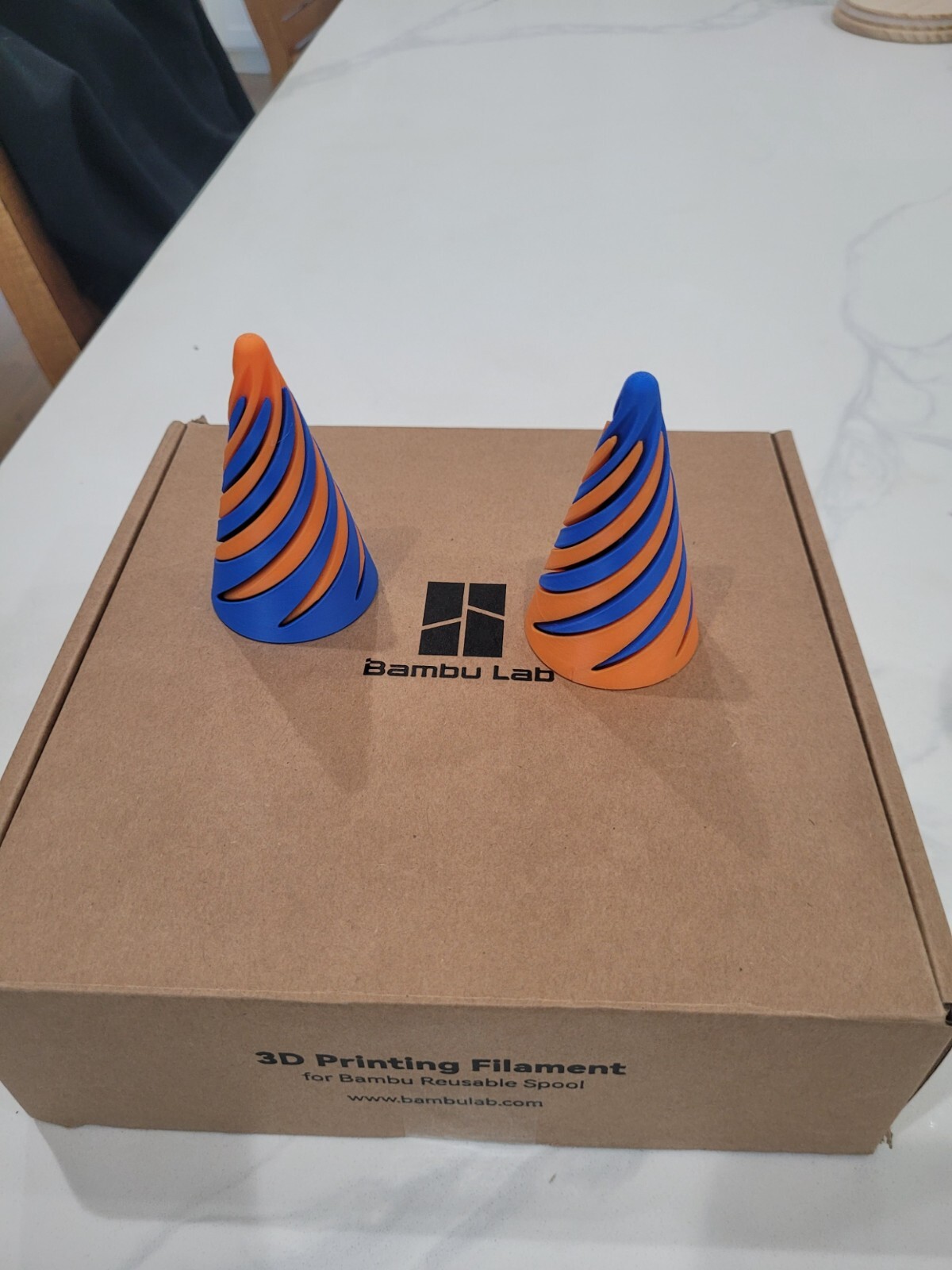 3d printed multi-color impossible passthrough spiral cone