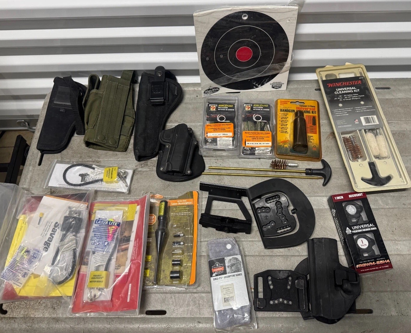 Lot of Bulldog Gun Holsters, Laser Boresighter,  Savage Lock W/ Keys, Boresnake