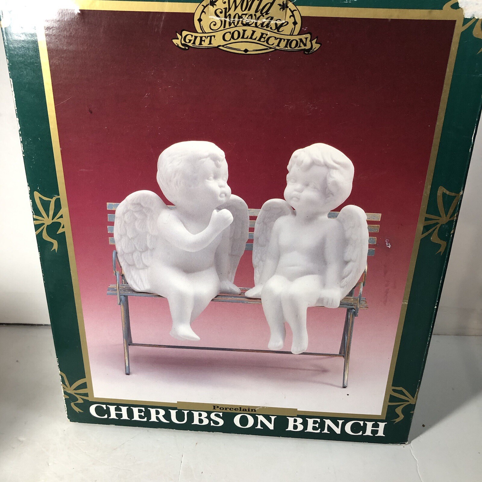 House of Lioy'd Christmas Setting on Bench Cherubs on Bench