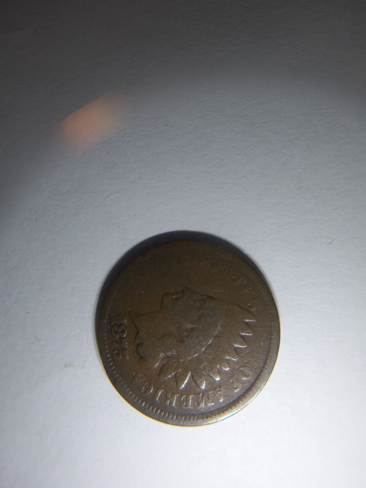 A KEY 1875 INDIAN HEAD PENNY