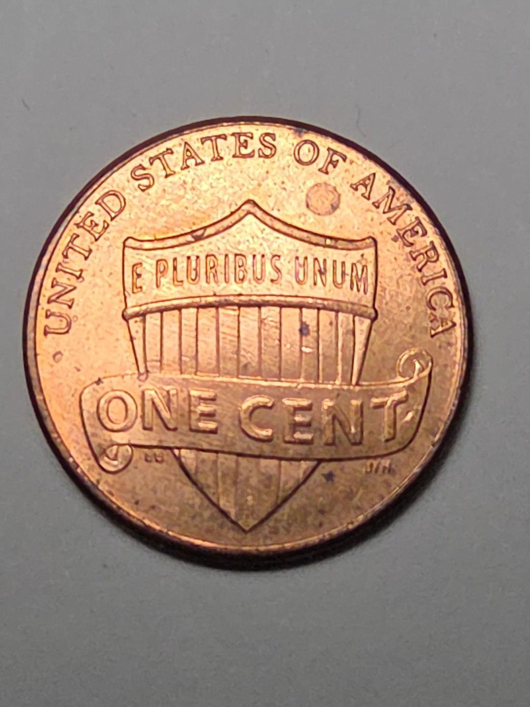 2015 P Penny with Die Chip Error on Reverse Top of Shield