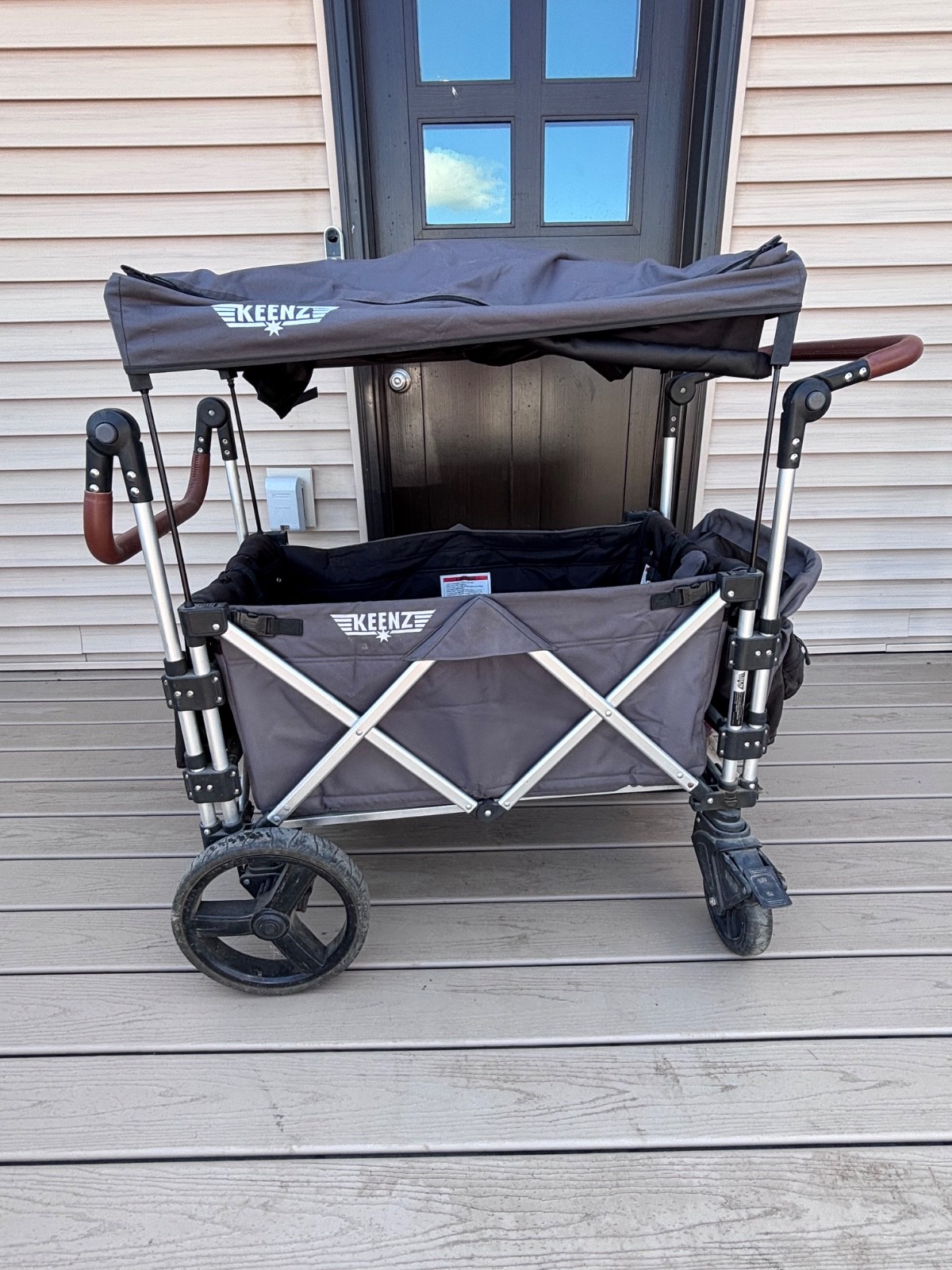 Keenz 7s Stroller Wagon - Gray includes canopies and all accessories.