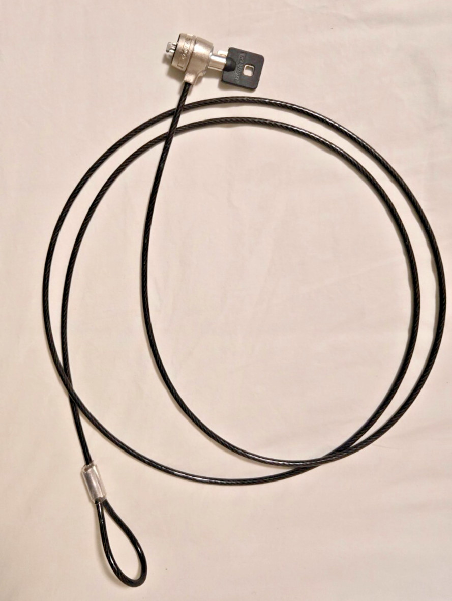 Cable lock for Compaq Armada laptop with 2 keys (laptop and chair not included)