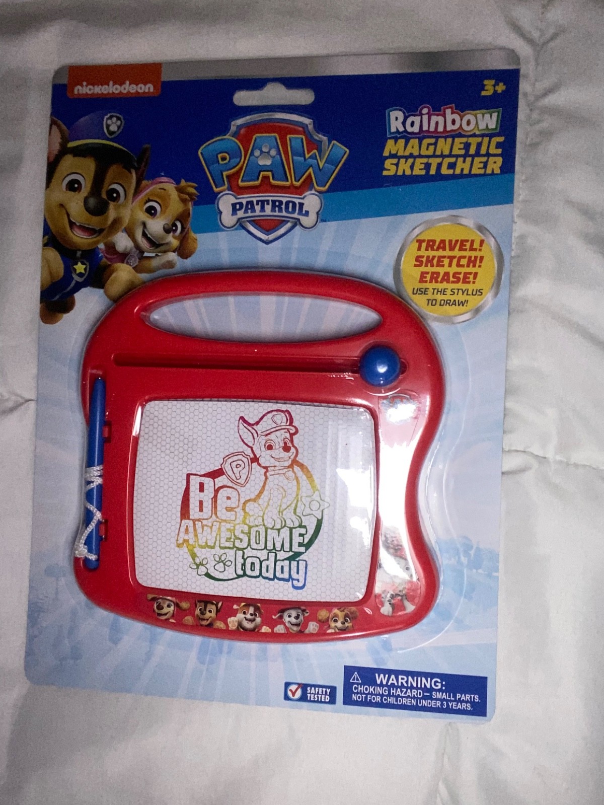 Kids learning Paw Patrol magnetic sketcher toy. Travel Sketch kids favorite