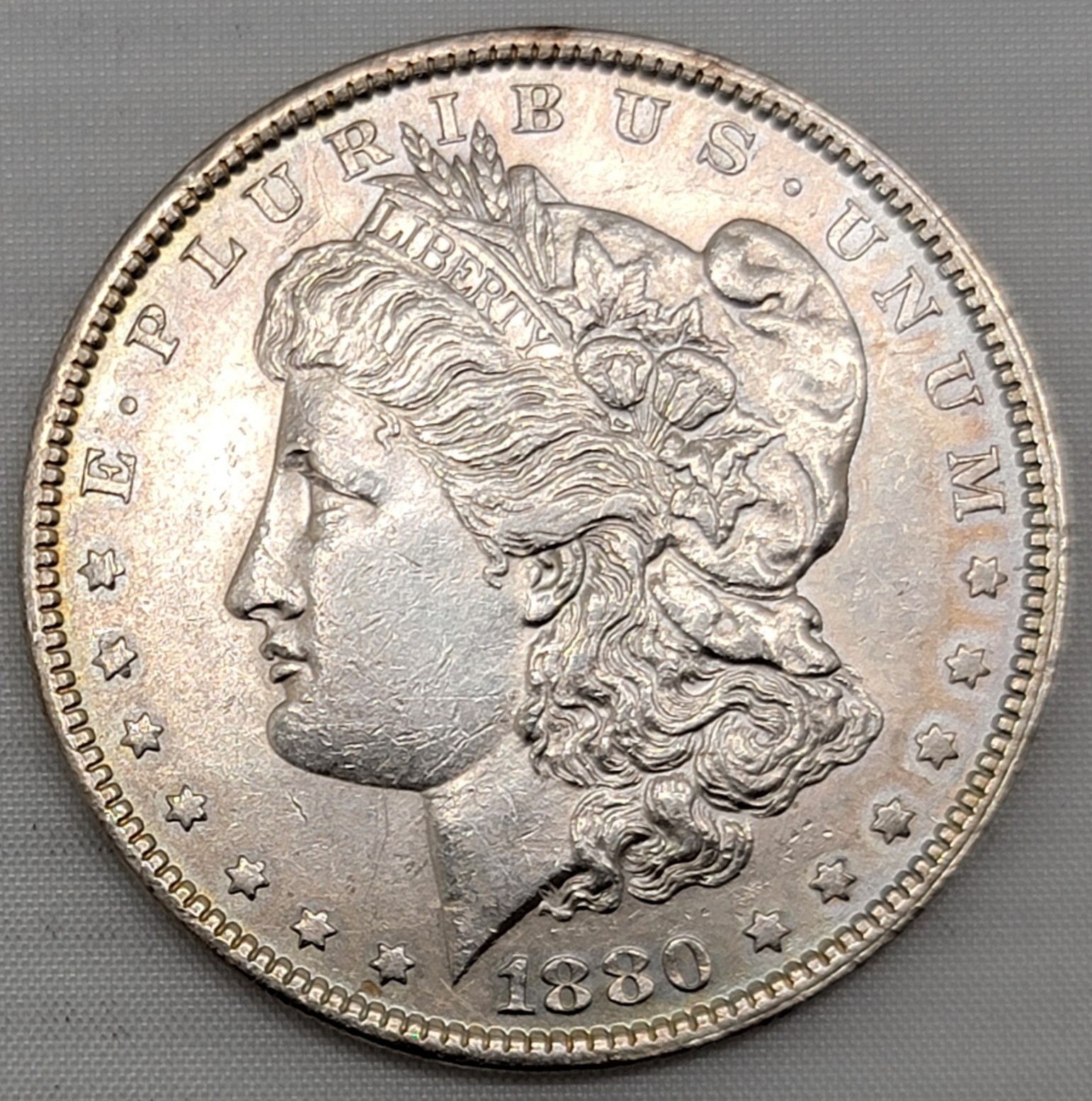 1880-P MORGAN SILVER DOLLAR IN HIGH-QUALITY CONDITION, EXCELLENT DETAIL FEATHERS