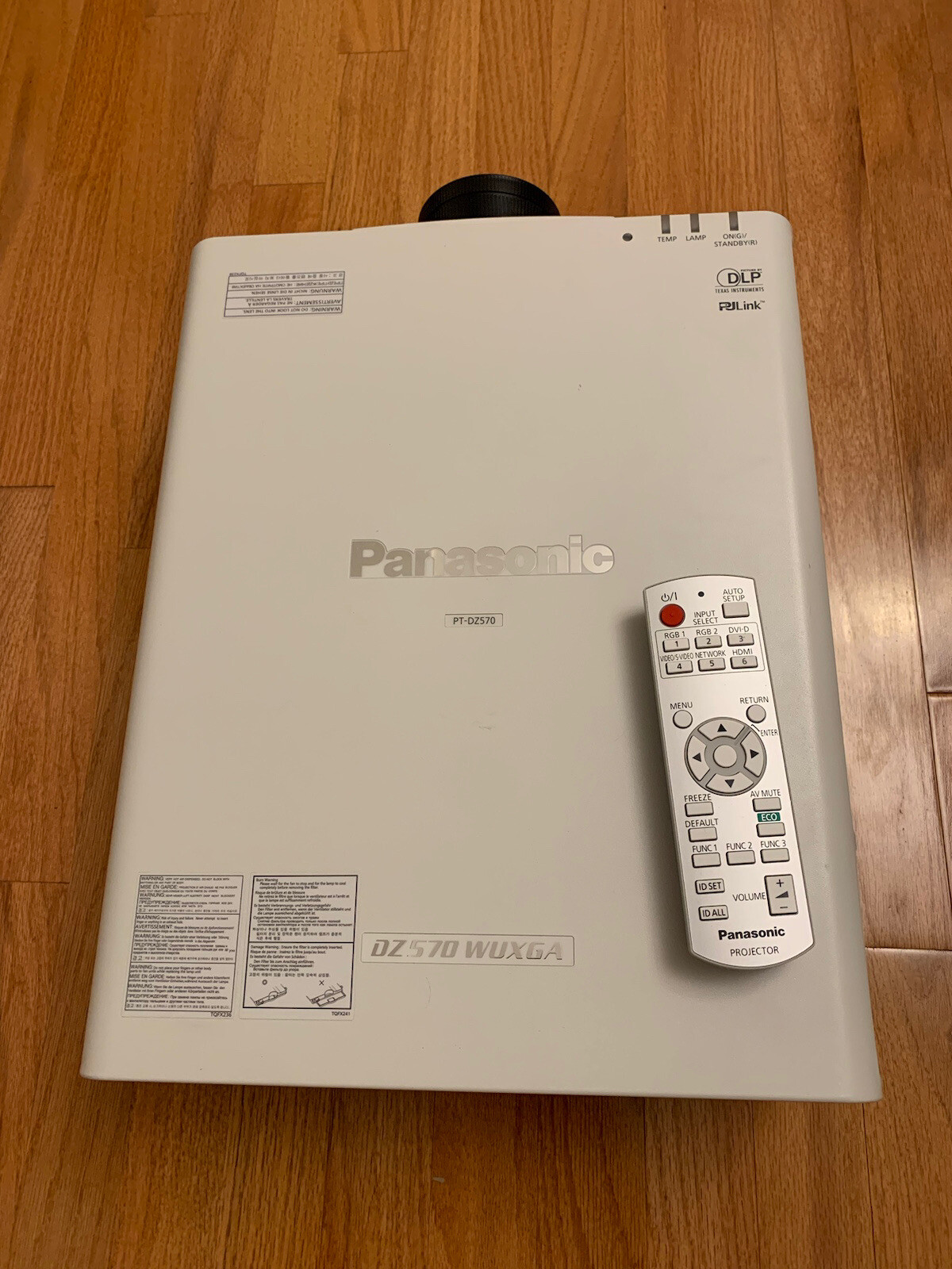 Panasonic PT-DZ570 (U) WUXGA DLP Projector w/ Remote, Lens and Lamp - Read!