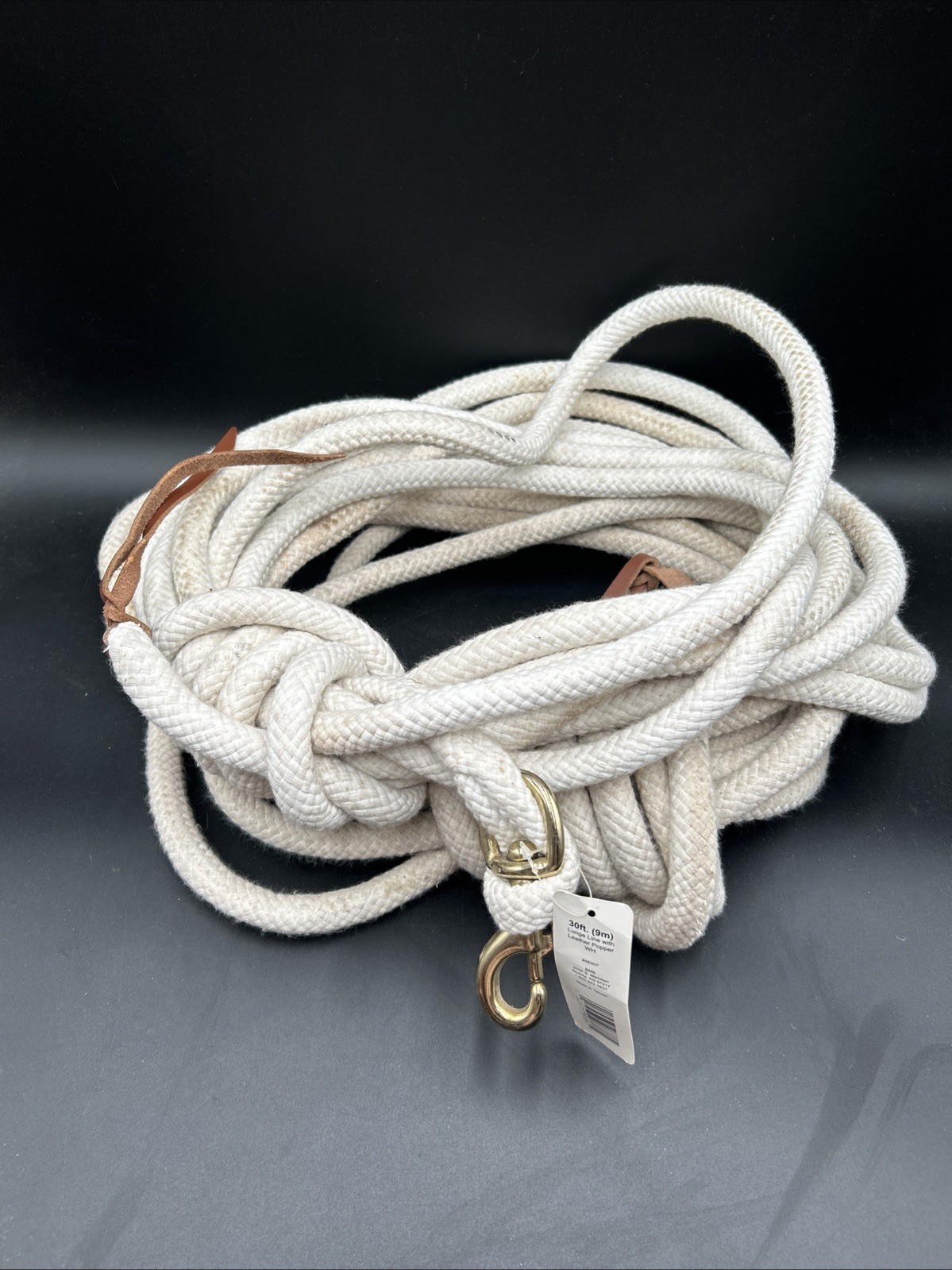 30-foot (9m) white lunge line with a leather popper and brass-tone snap hardware