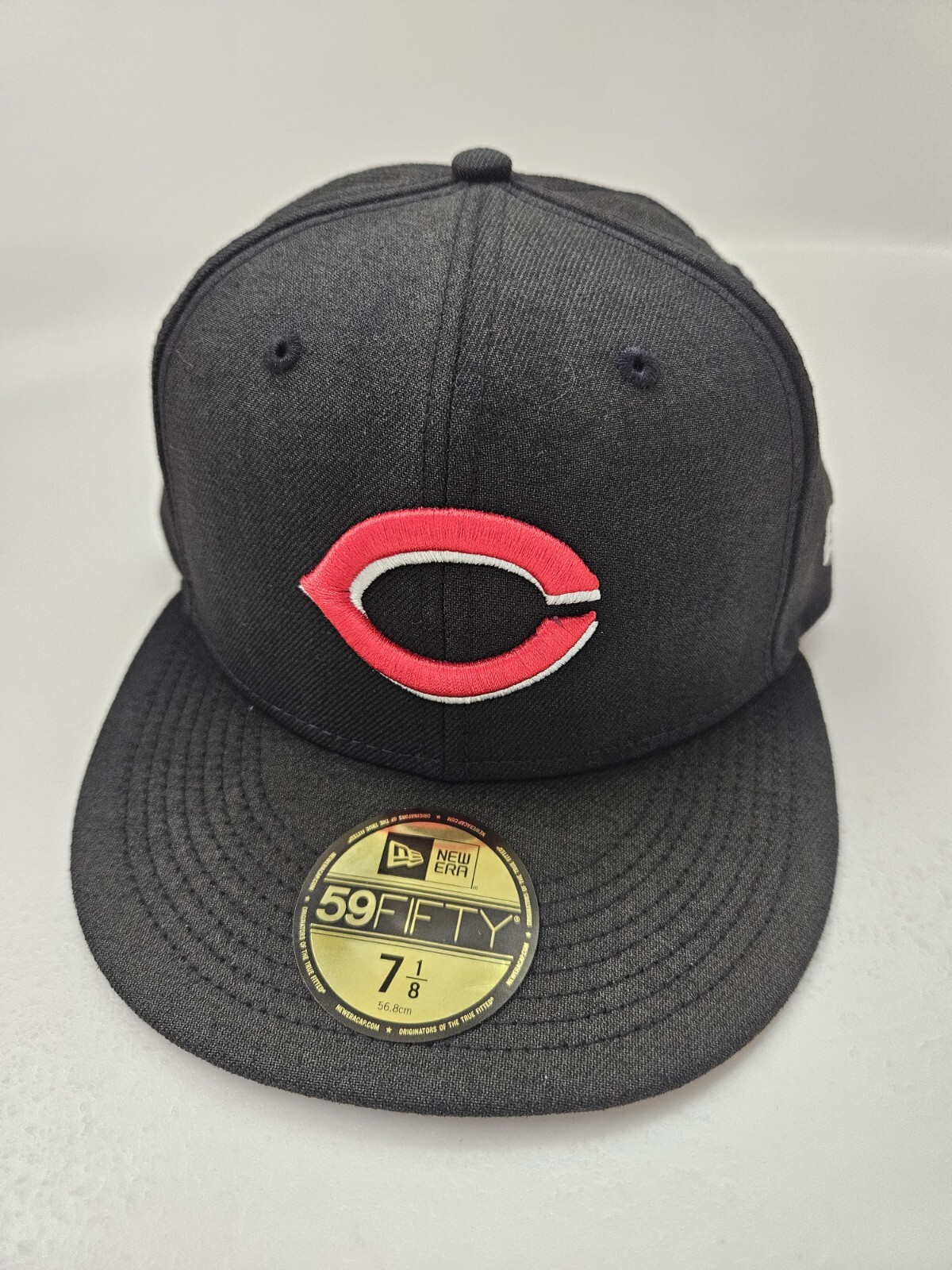 Cincinnati Reds New fitted hat 7 1/8. Faded Black Style.