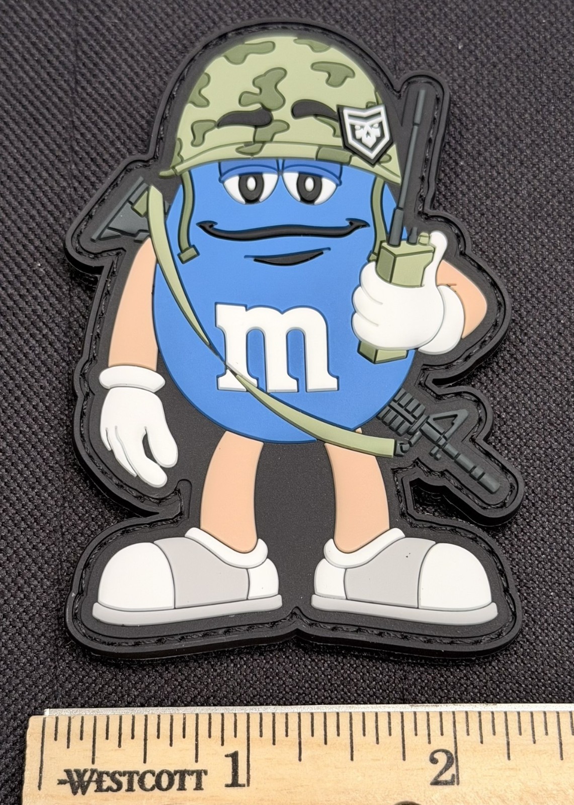 Tactical M&M PVC Patch backed with both hook and loop AND adhesive sticker, 1of5