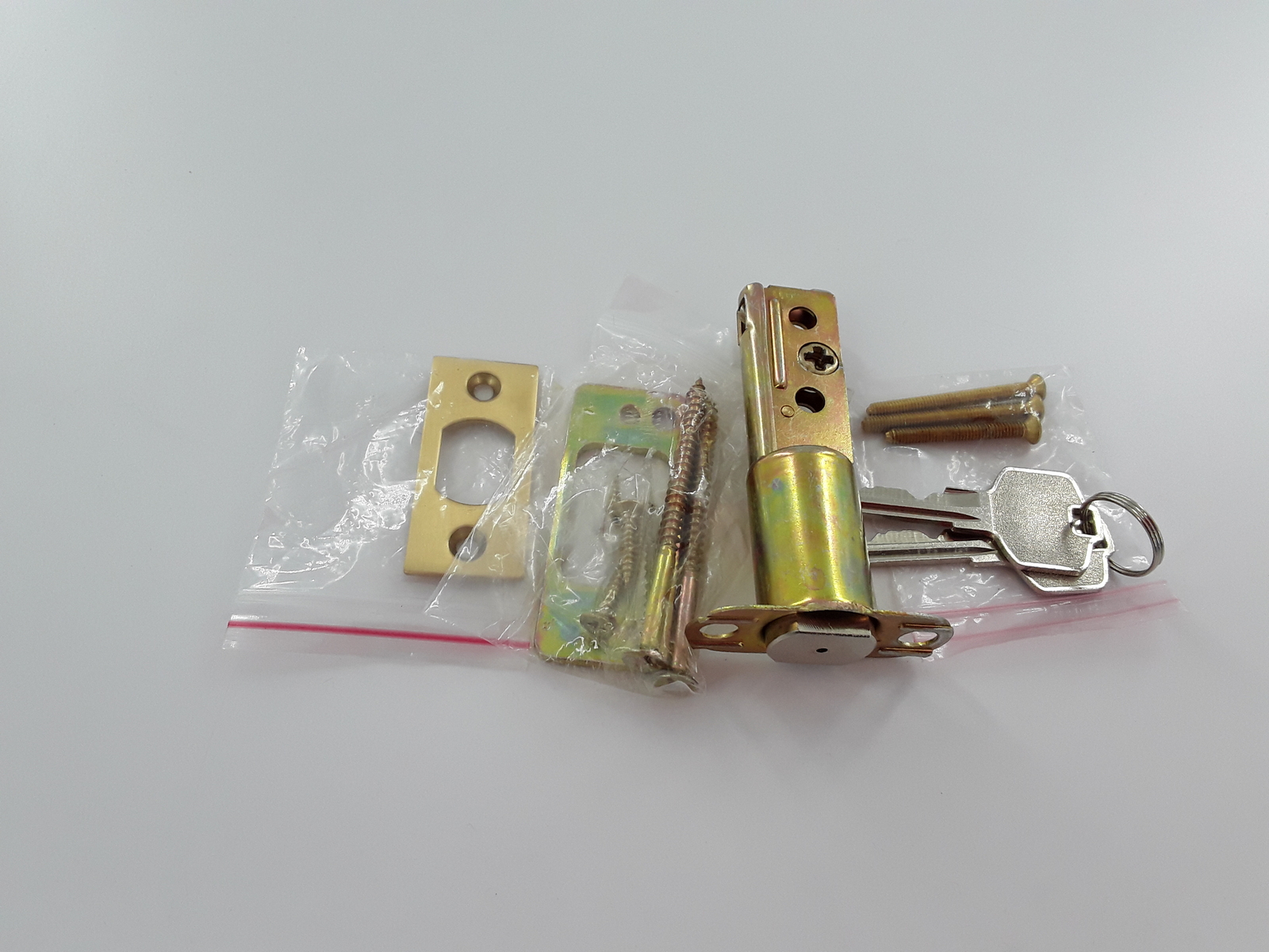 DEADBOLT 2-3/4' LATCH SET- INCLUDES LATCH STRI PLATE ,FACE PLATE DUST BOX ,