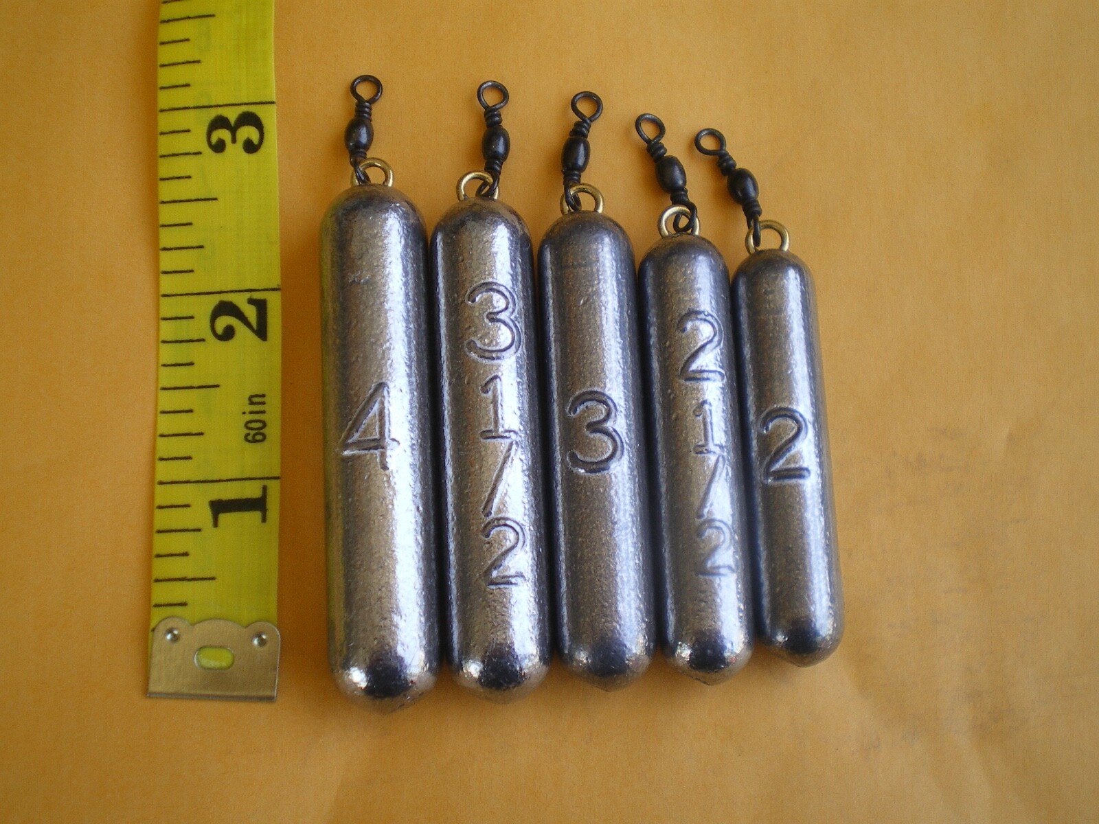 15 B. BOUNCER PENCIL SINKER 2,2-1/2,3,3-1/2,4 OZ/3ea. W/BLACK SWIVEL/BRASS EYE