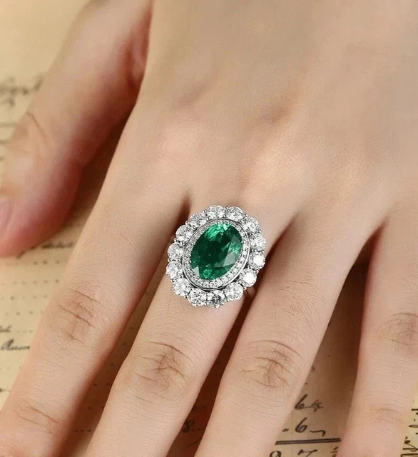 2.50Ct Oval Lab Created Emerald Women's Engagement Ring 14K White Gold Plated