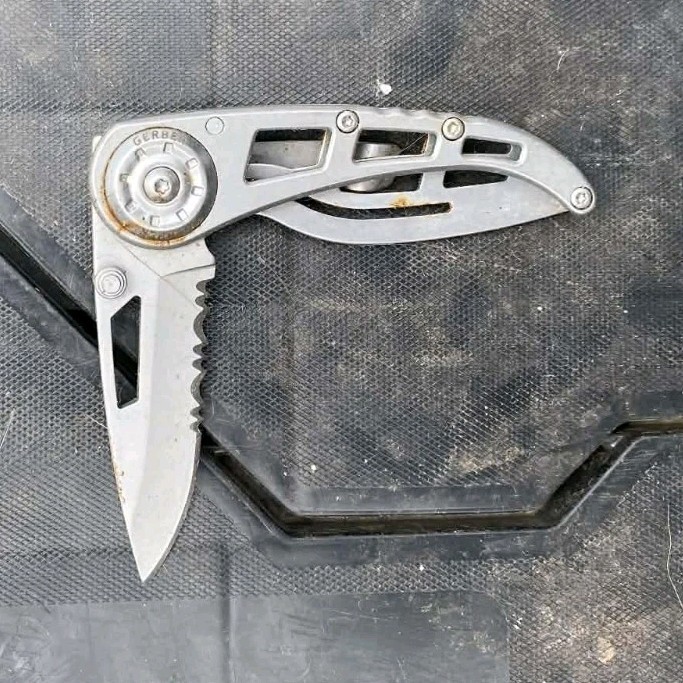 Silver Partially Serrated Stainless Steel Pocket Knife with Metal Handle