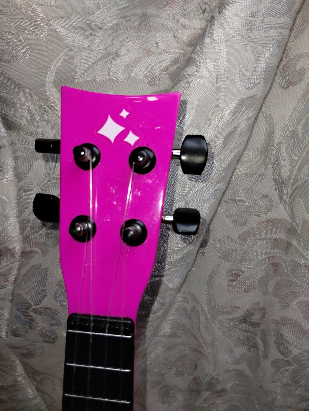 First Act Discovery Shimmer and Shine soprano toy ukulele.