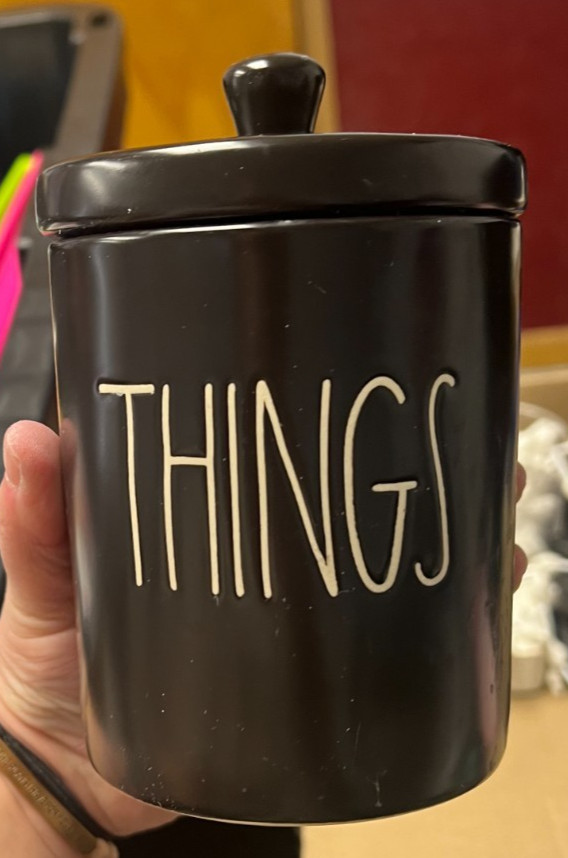 "Things" bathroom organizing - black ceramic jar