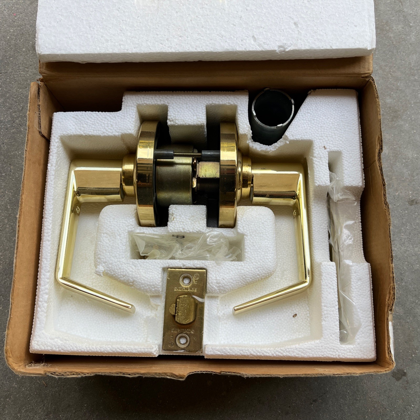 Schlage Saturn Passage Storeroom Handle Brass