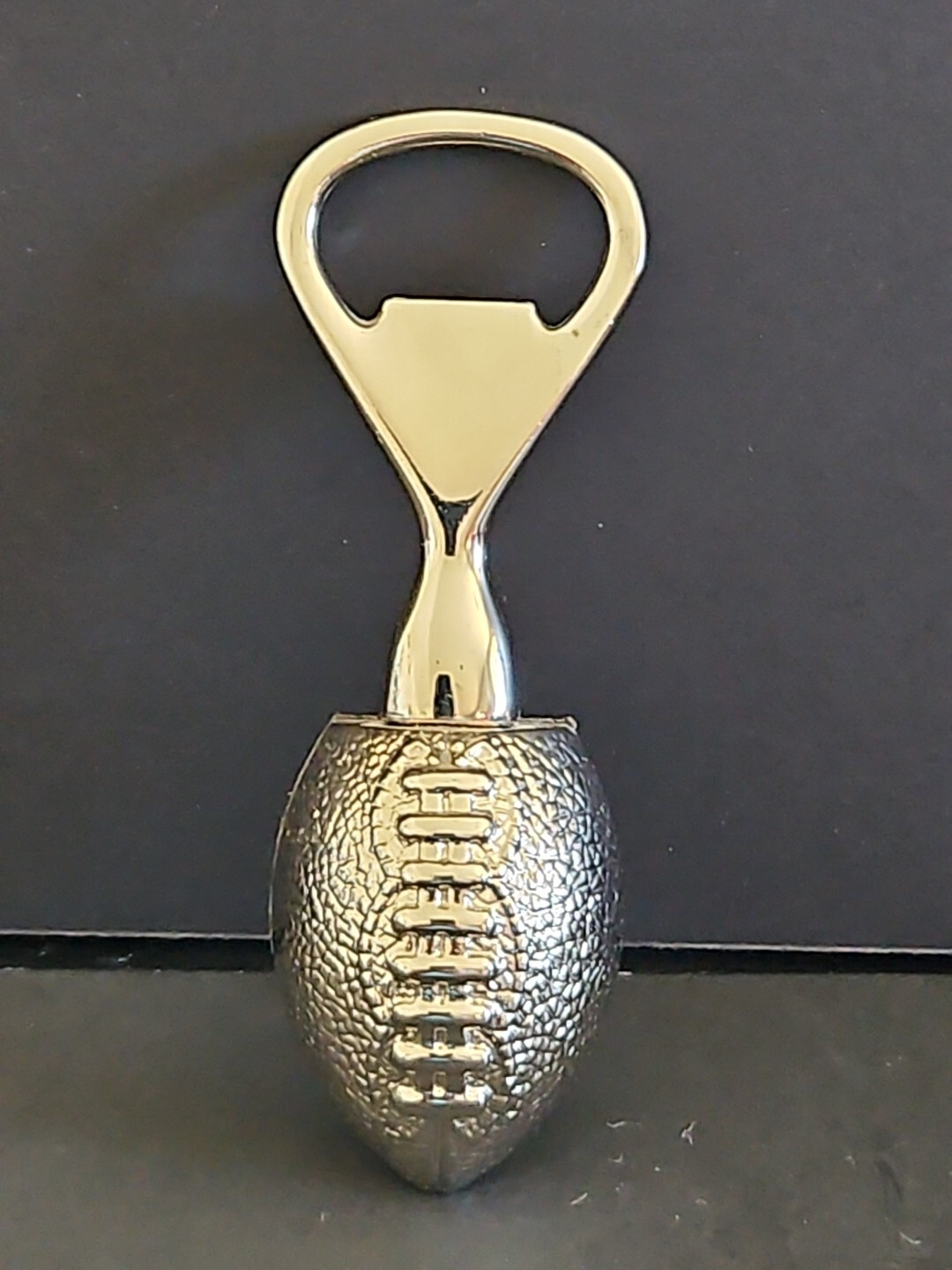 VINTAGE BEAUTIFUL FOOTBALL BOTTLE OPENER WITH FELT BACKING HEAVY AND EXCELLENT