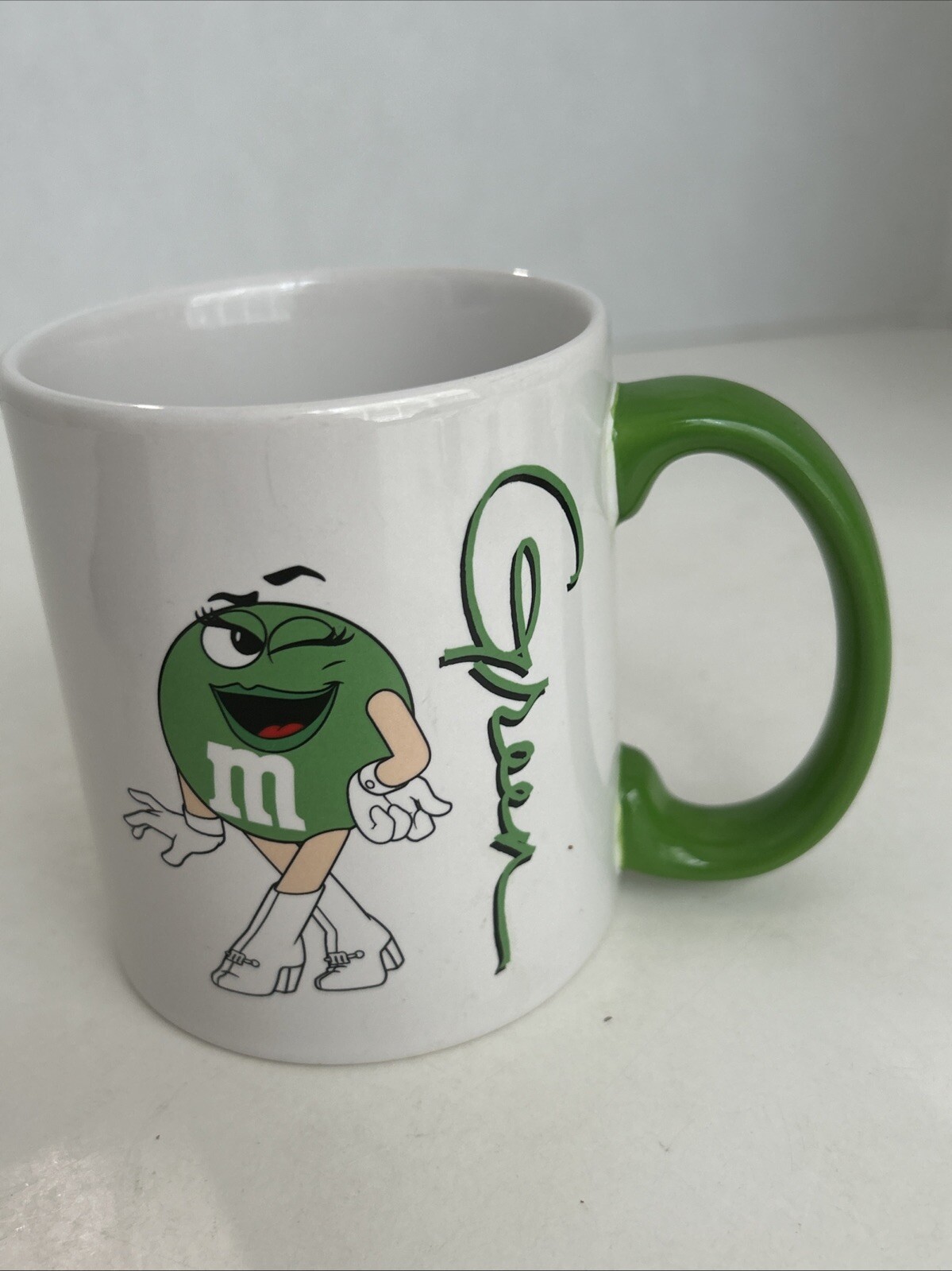 M&Ms Miss Green Logo Mars Candy Coffee Mug 12 oz