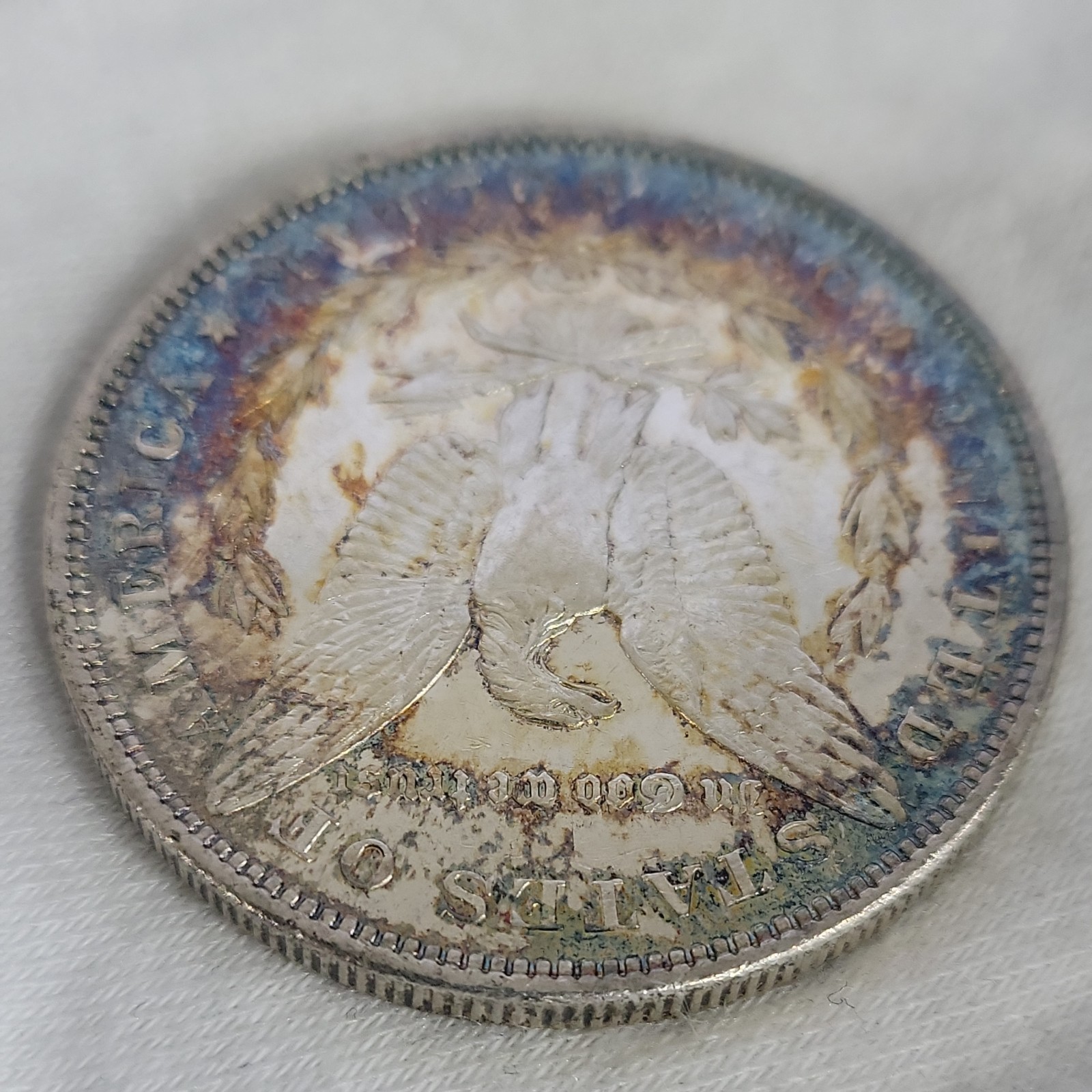 1879 Morgan Silver Dollar in BU Condition with toning on reverse