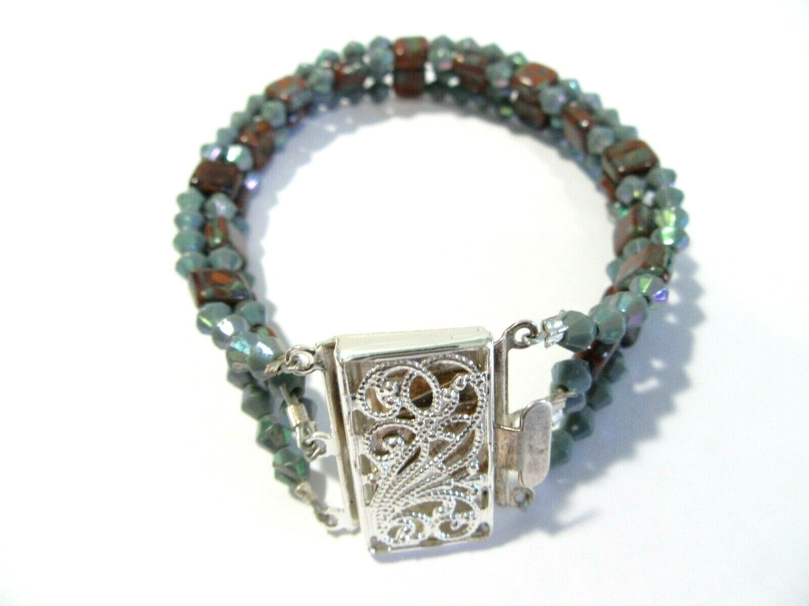 BLUE AND BROWN PLASTIC MULTI-STRAND BEADED BRACELET PRETTY WITH FANCY CLASP