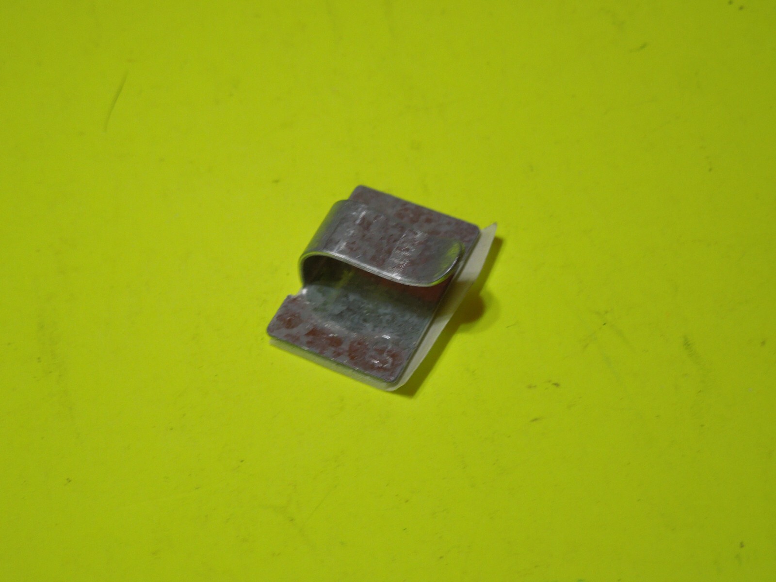 1 NOS OEM Harley Davidson Small - Adhesive Back Clip P/N 10102