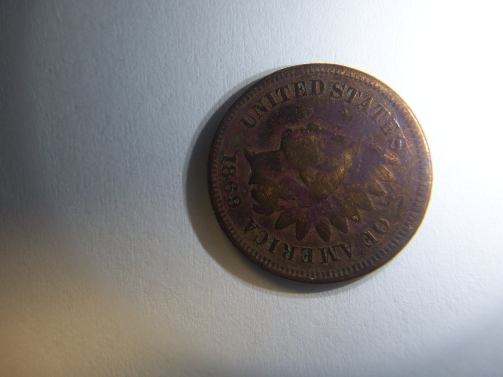 A RARE 1869 INDIAN HEAD PENNY