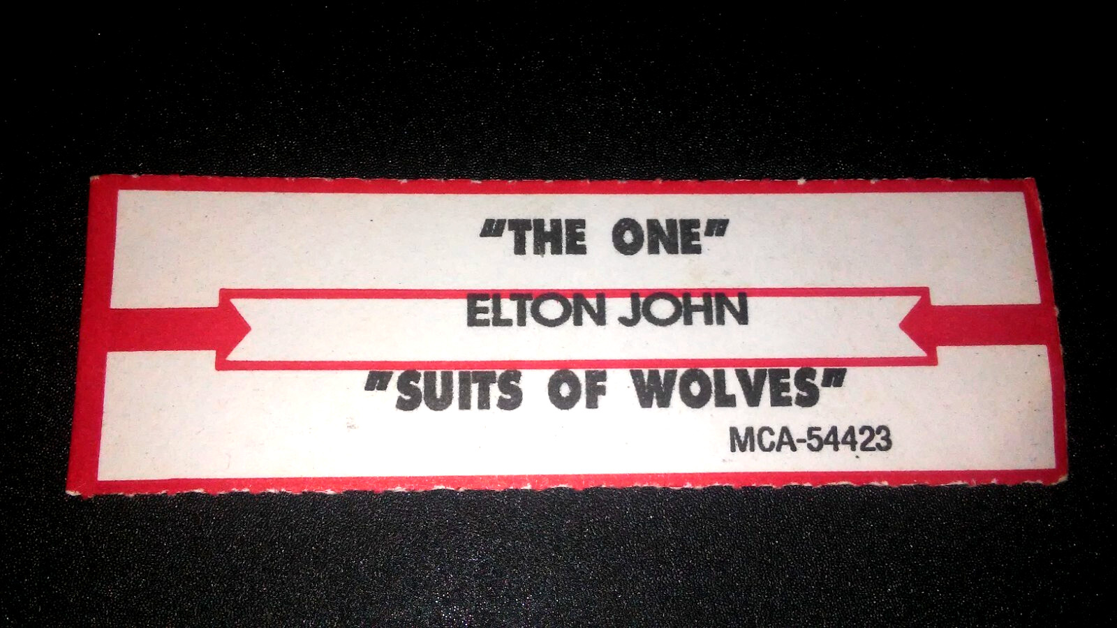 JUKEBOX STRIP (1) ELTON JOHN The One/Suits Of Wolves 45 L@@K!