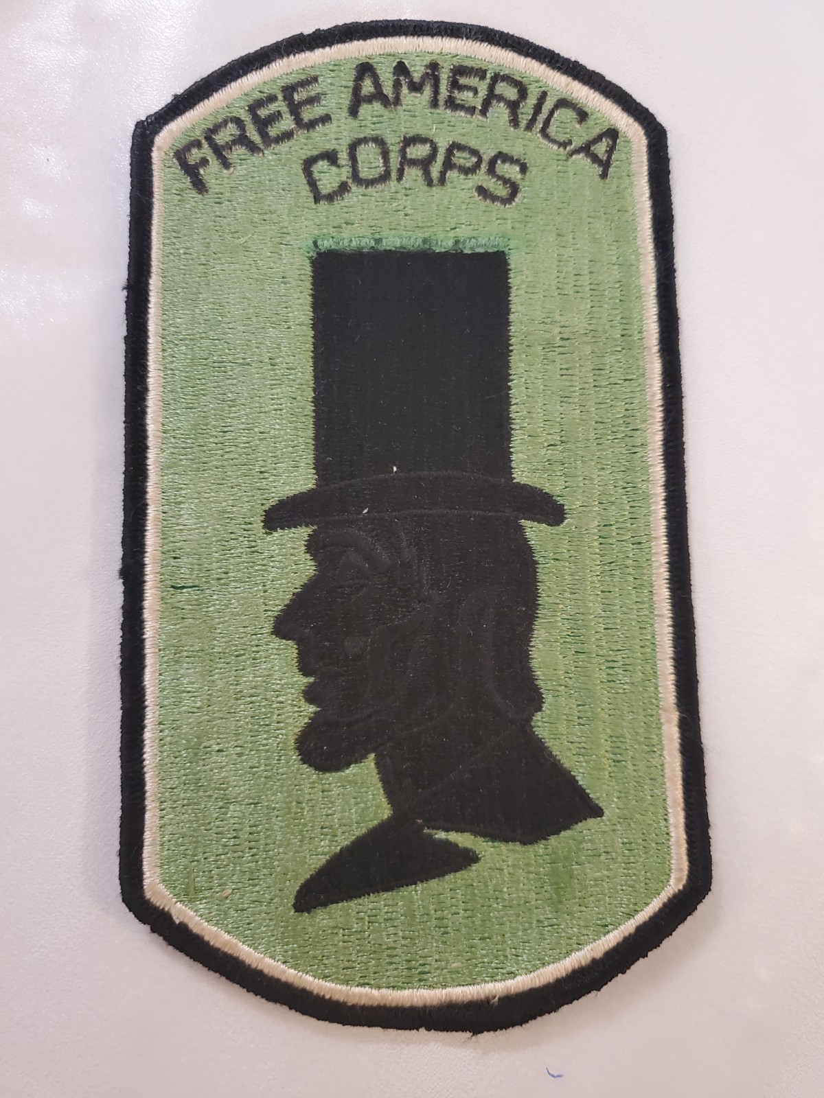 Obsolete  "FREE AMERICA CORPS" Vietnam Era