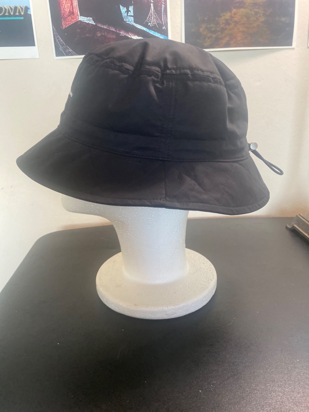 Jacquemus bucket hat black quilted style brim white logo