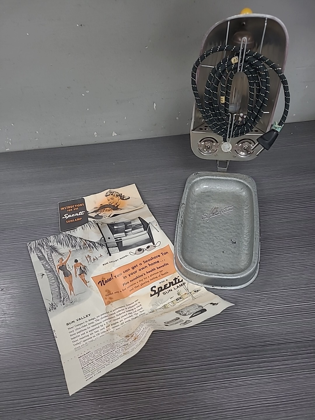Ultraviolet Sun Lamp Model P-105 Sperti 1950's with tags art deco red
