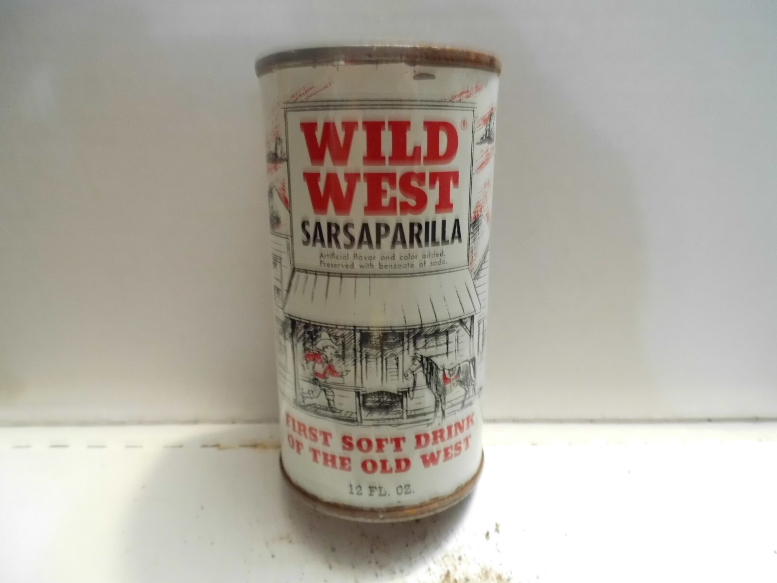 WILD WEST SARSAPARILLA FLAT TOP/PULL TOP?? SODA CAN~WORLD TRADE INC.,LORAIN,OHIO