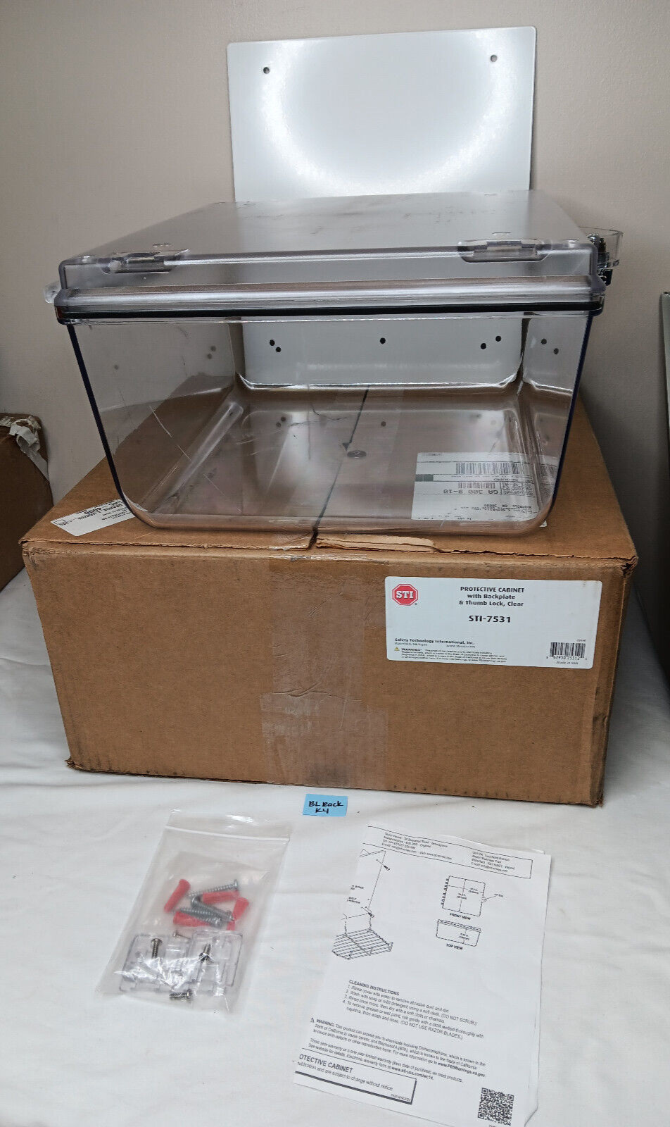 STI 7531 Protective Cabinet with back plate and thumb lock  clear