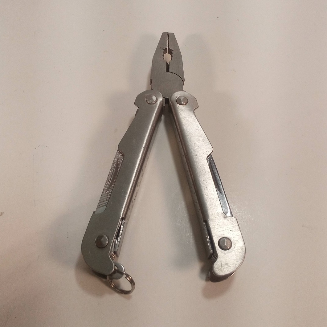 Silver Metal Multi-Tool with Pliers and Fold-Out Tools (U-10)