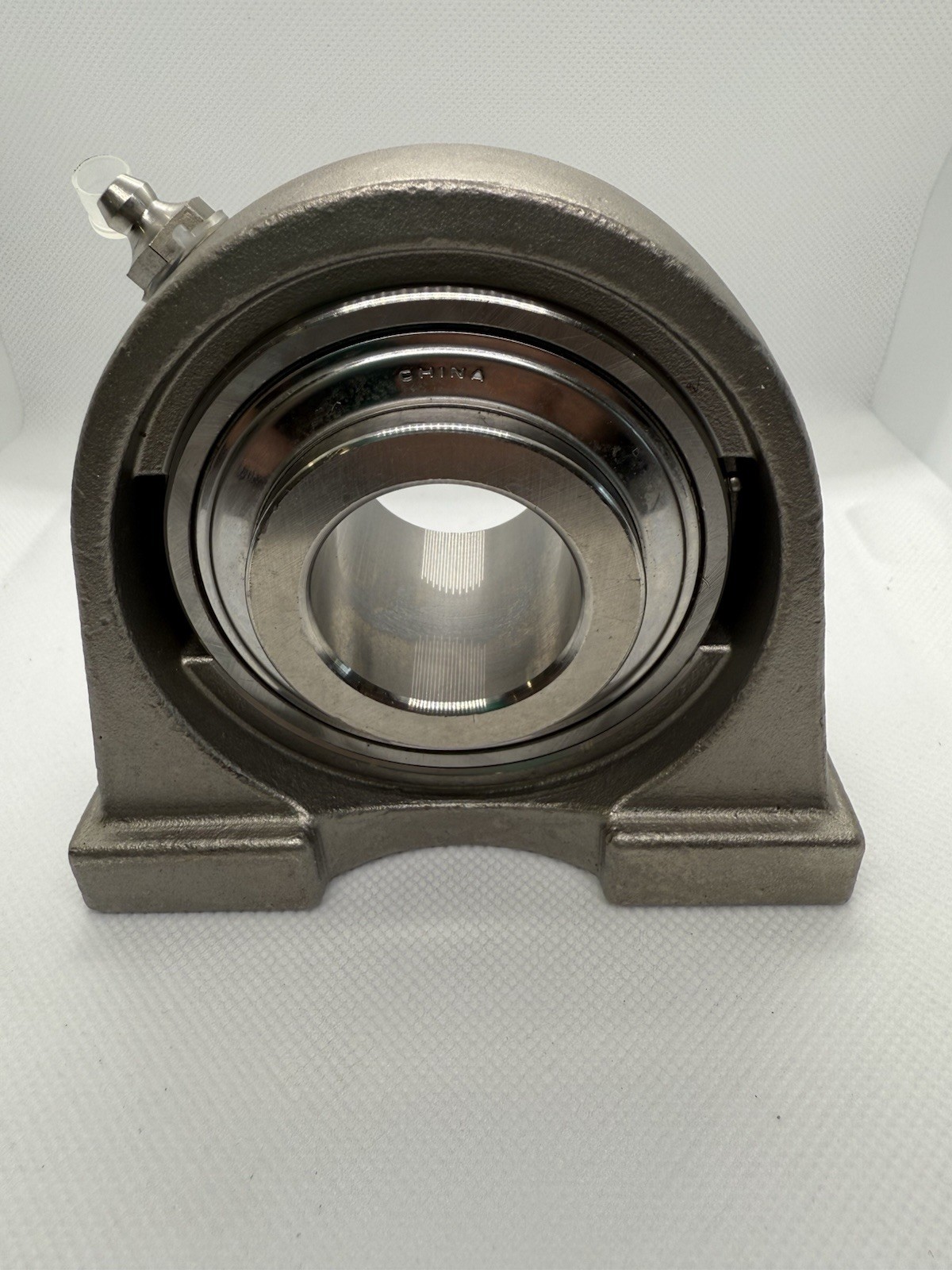 SUCSPA207-20 | Stainless UCPA207-20 Pillow Block 1-1/4" Bore Tapped Base