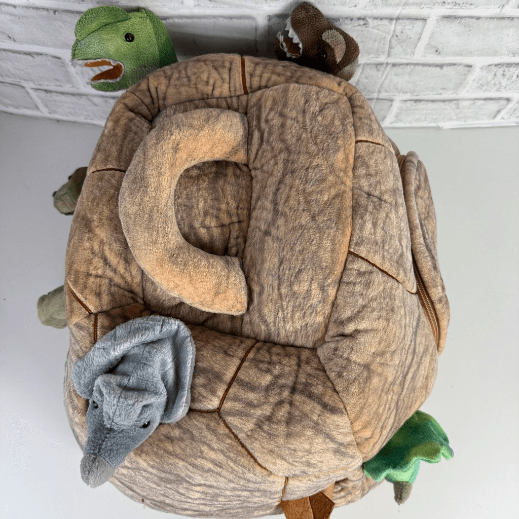 FAO Schwarz Dinosaurs in a Rock House Plush with Dinosaurs