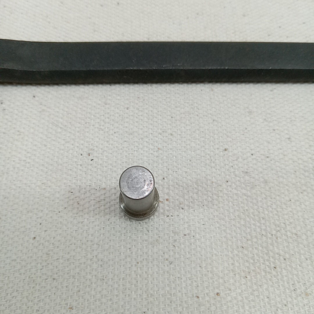 M1 Carbine Gas Piston Nut Wrench with a Piston