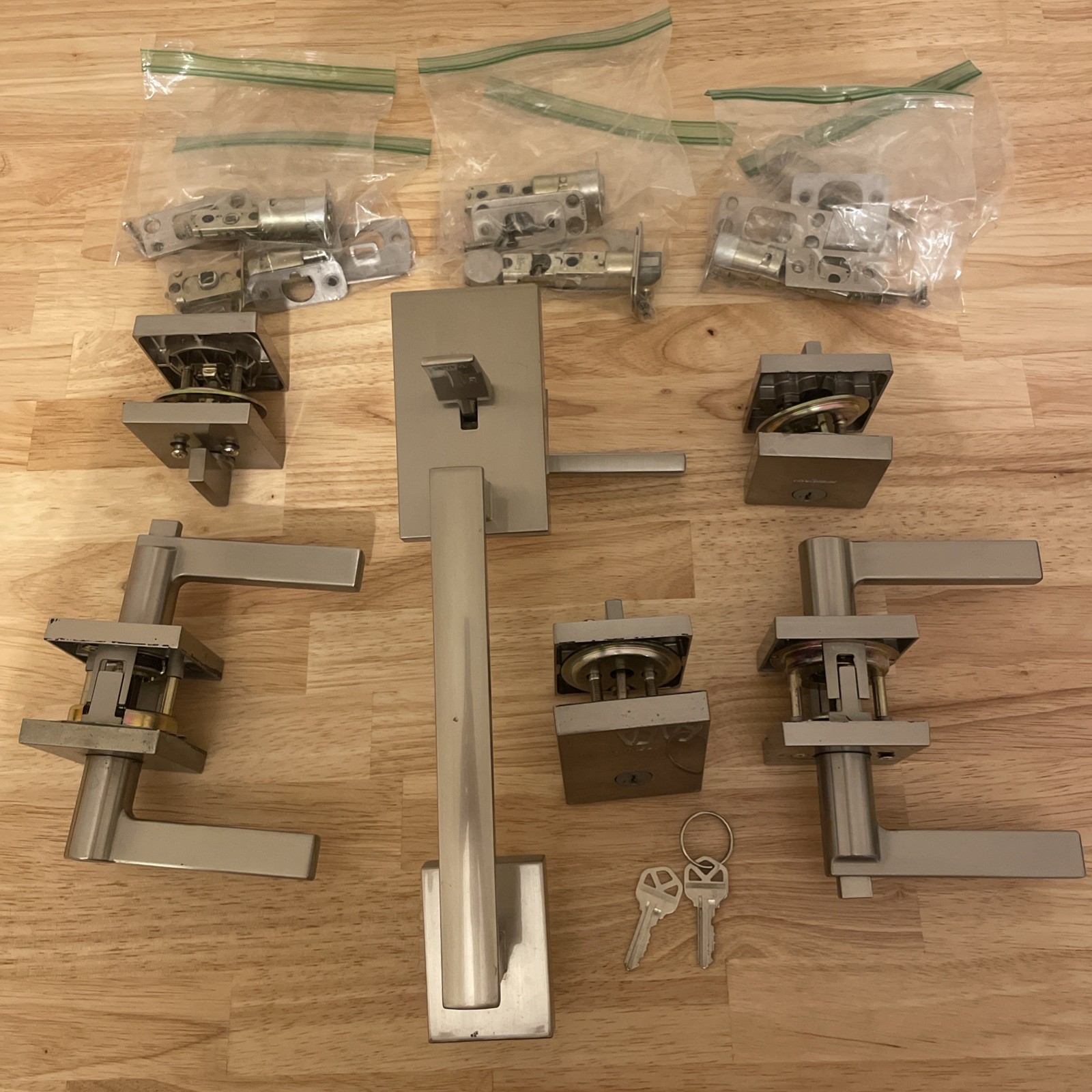 Kwikset San Clemente Satin Nickel Handleset,  Halifax Square Lever Sets x3