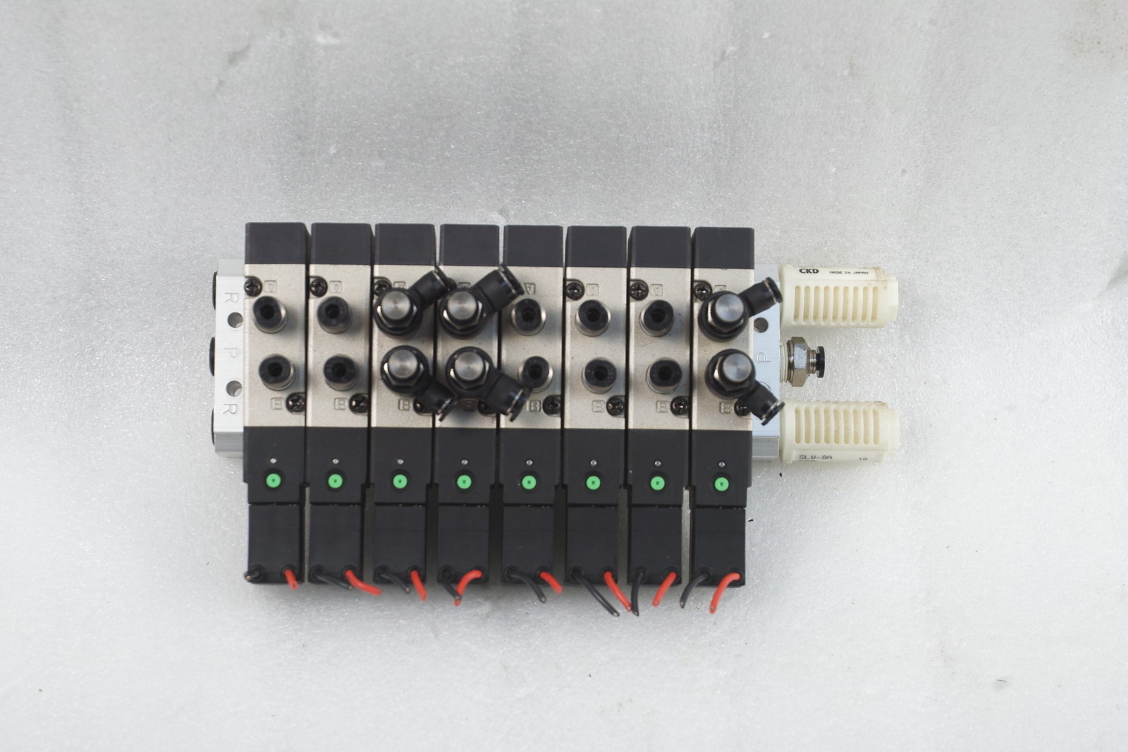 CKD 4KA210 EIGHT VALVES WITH OTHER MOUDLES, MANIFOLD, FILTERS AND MANY COUPLERS.