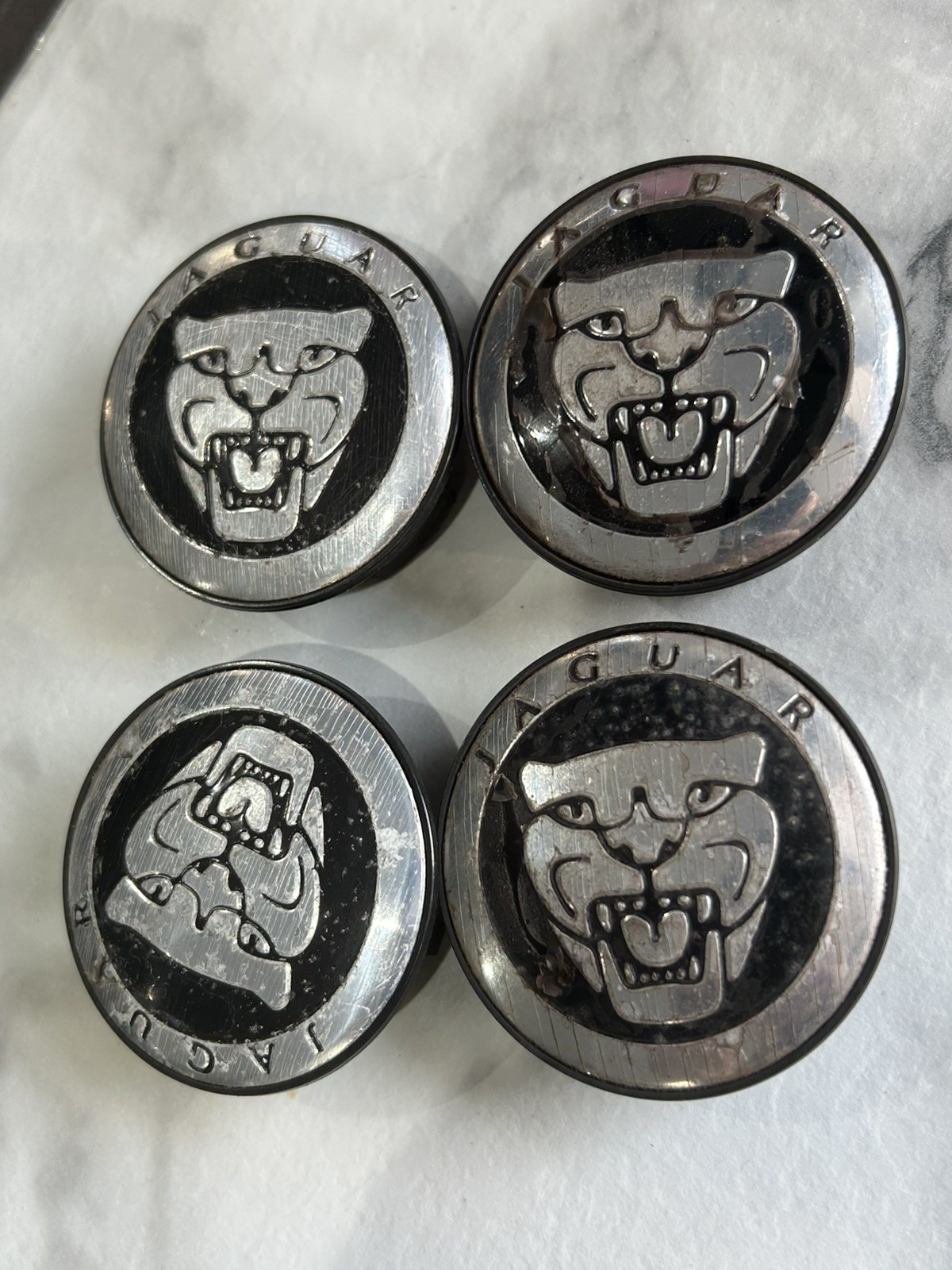 4 x 58mm chrome / Black used centre caps will fit Jaguar alloy wheels c151
