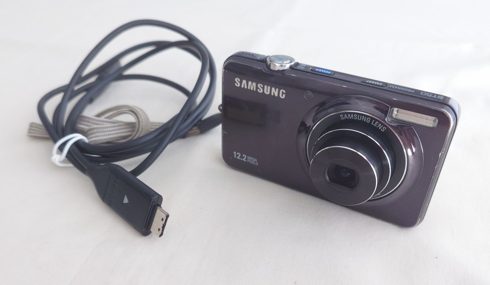 Samsung ST50 12.2MP Digital Compact Camera, With Charging Cable - Working Order