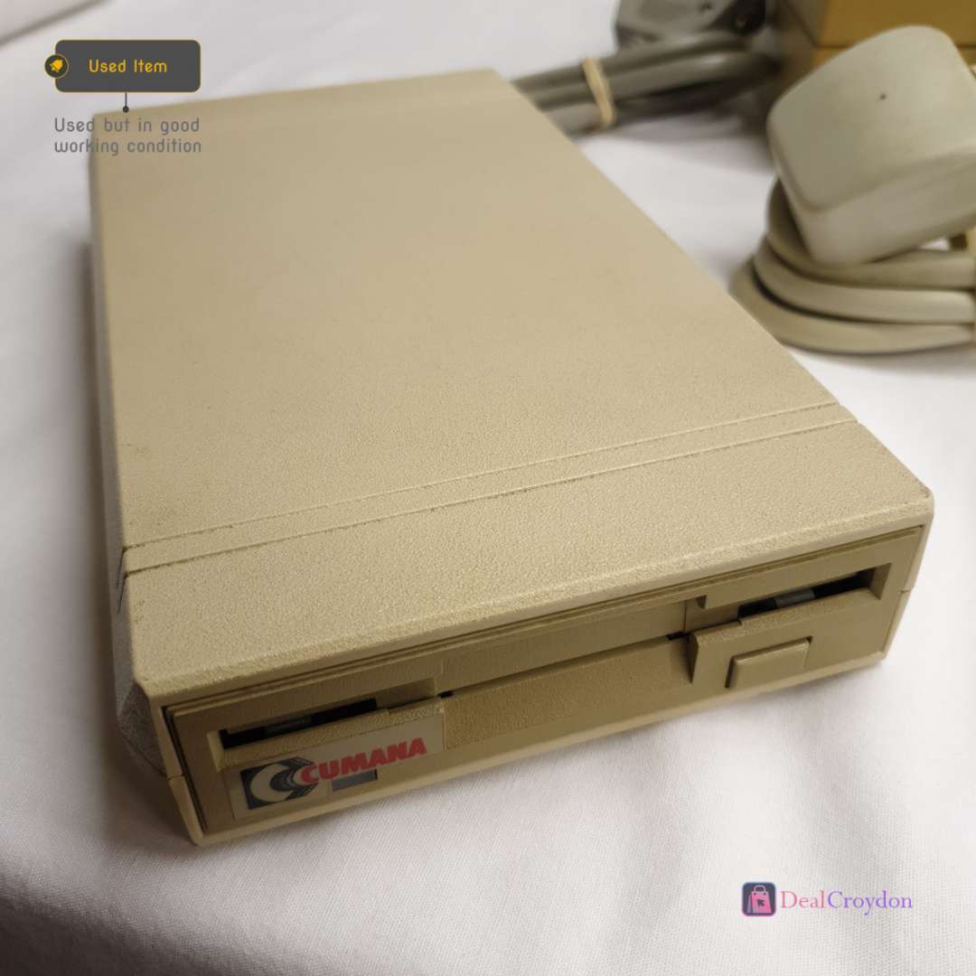 COMMODORE AMIGA A500 COMPUTER +COMMODORE A520 +MOUSE + 10 DISKS + POWER SUPPLY