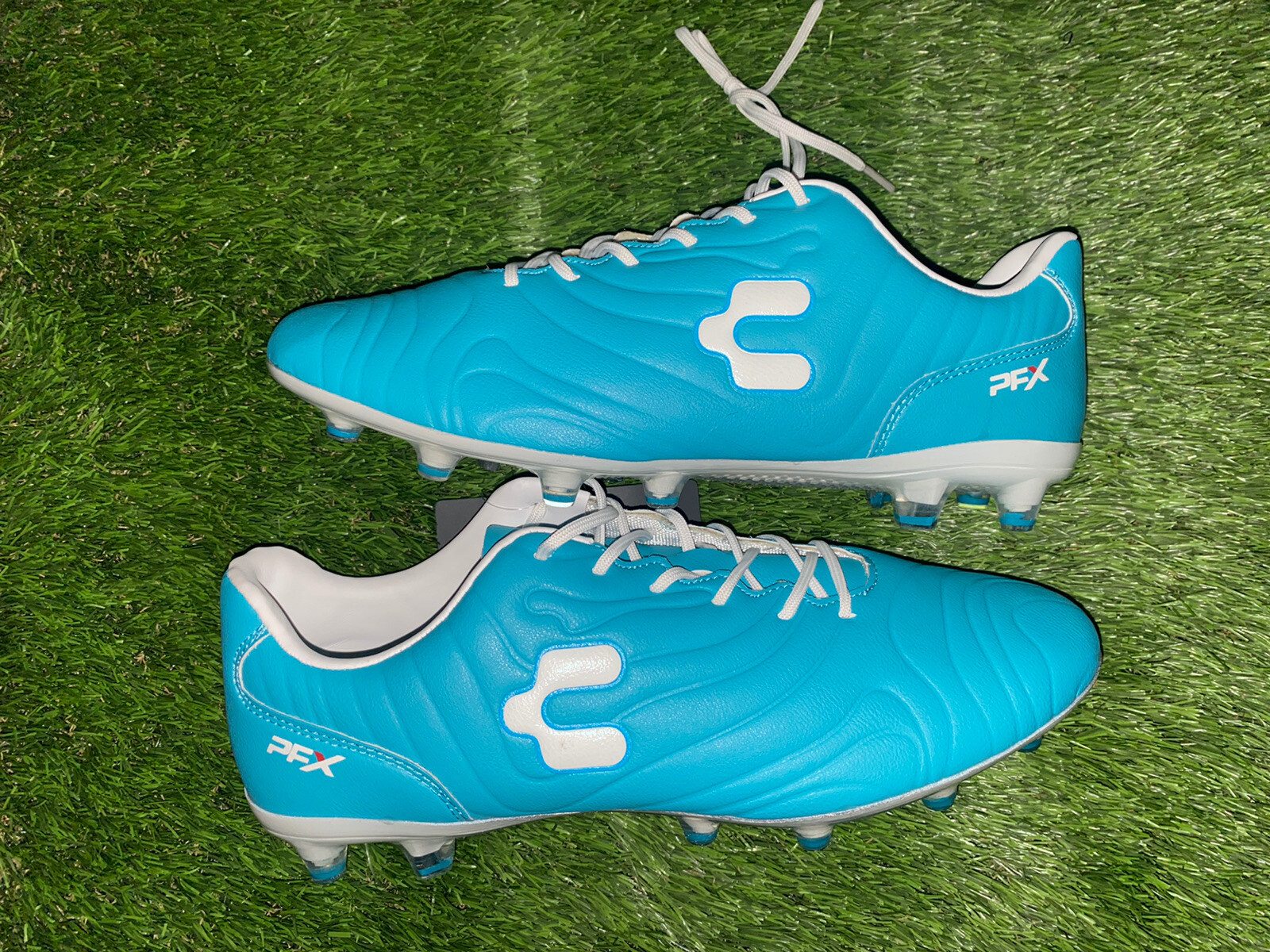CHARLY MENS STORM FG SOCCER CLEATS SIZE 8.5 MENS NWOB TURQUOISE