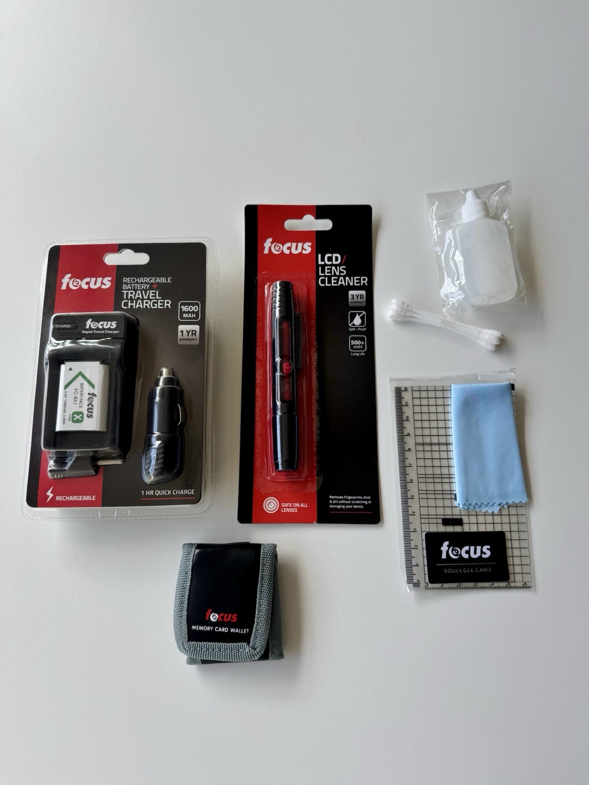 Focus Photo Accessories: Travel Charger Kit Lens Cleaner SD Card Holder + More